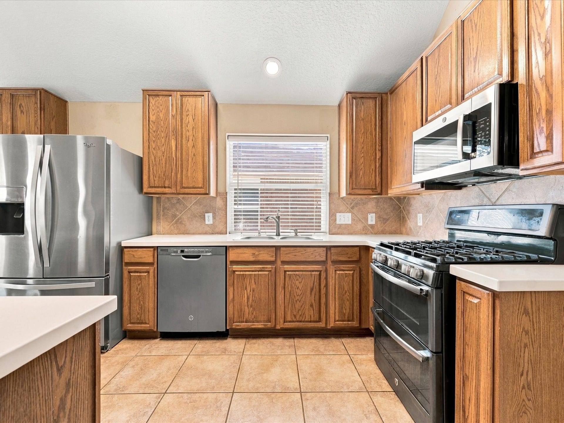 30026 Luna Lakes Drive, Spring, TX 77386 With ample cabinetry and an open connection to the living areas, the kitchen makes everyday meal preparation and busy routines feel a little more effortless.