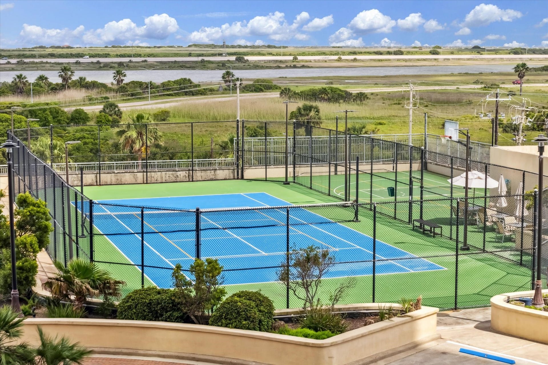 801 E Beach Drive, #BC2808, Galveston, TX 77550 Tennis, pickleball, and basketball courts offer residents plenty of ways to stay active, play together, and enjoy the outdoors