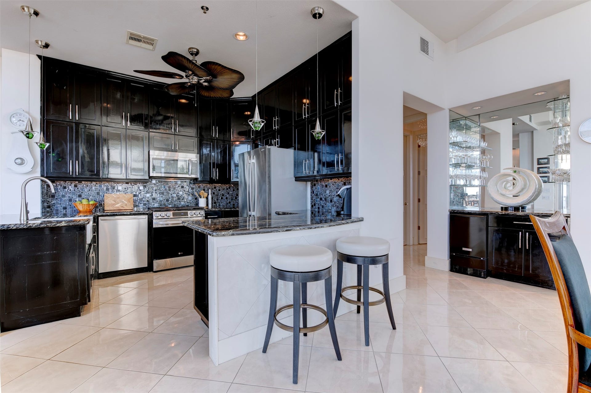 801 E Beach Drive, #BC2808, Galveston, TX 77550 Expansive penthouse kitchen with dramatic floor-to-ceiling cabinetry and exceptional storage