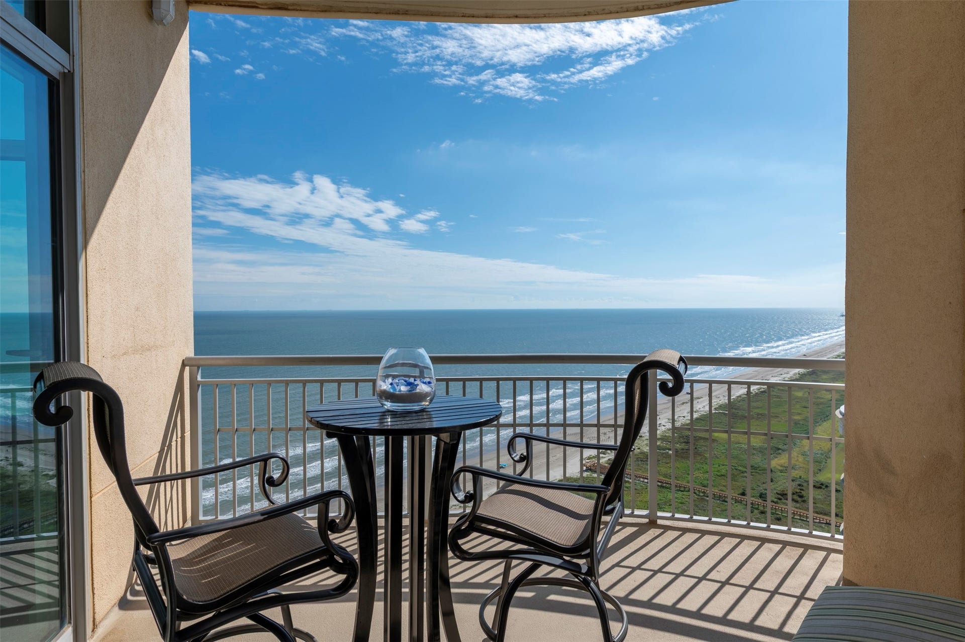 801 E Beach Drive, #BC2808, Galveston, TX 77550 Private beach balcony with sweeping Gulf views and a long stretch of Galveston coastline