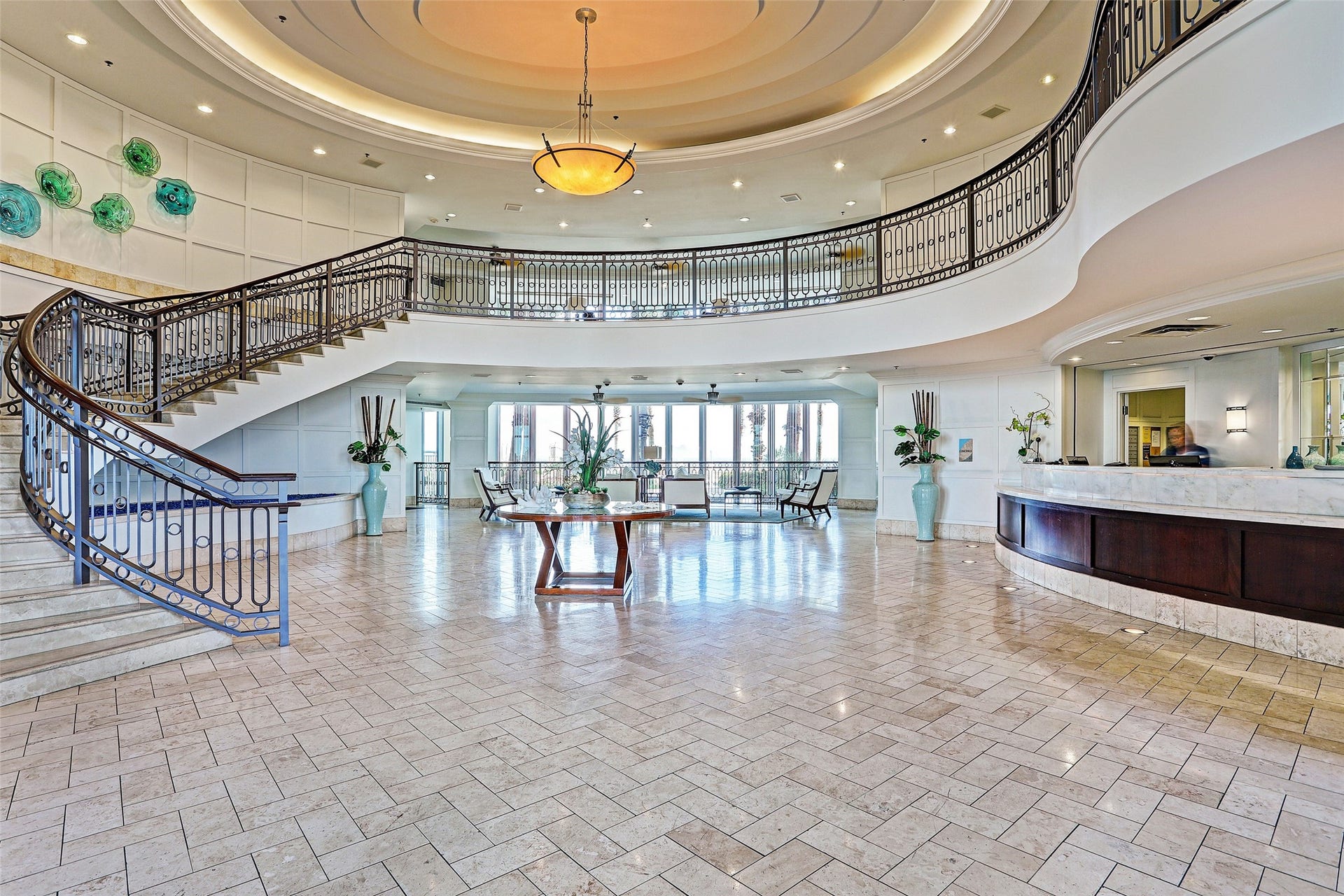 801 E Beach Drive, #BC2808, Galveston, TX 77550 The elegant two-story lobby welcomes you with sweeping views, timeless coastal style, and the ease of 24/7 concierge service
