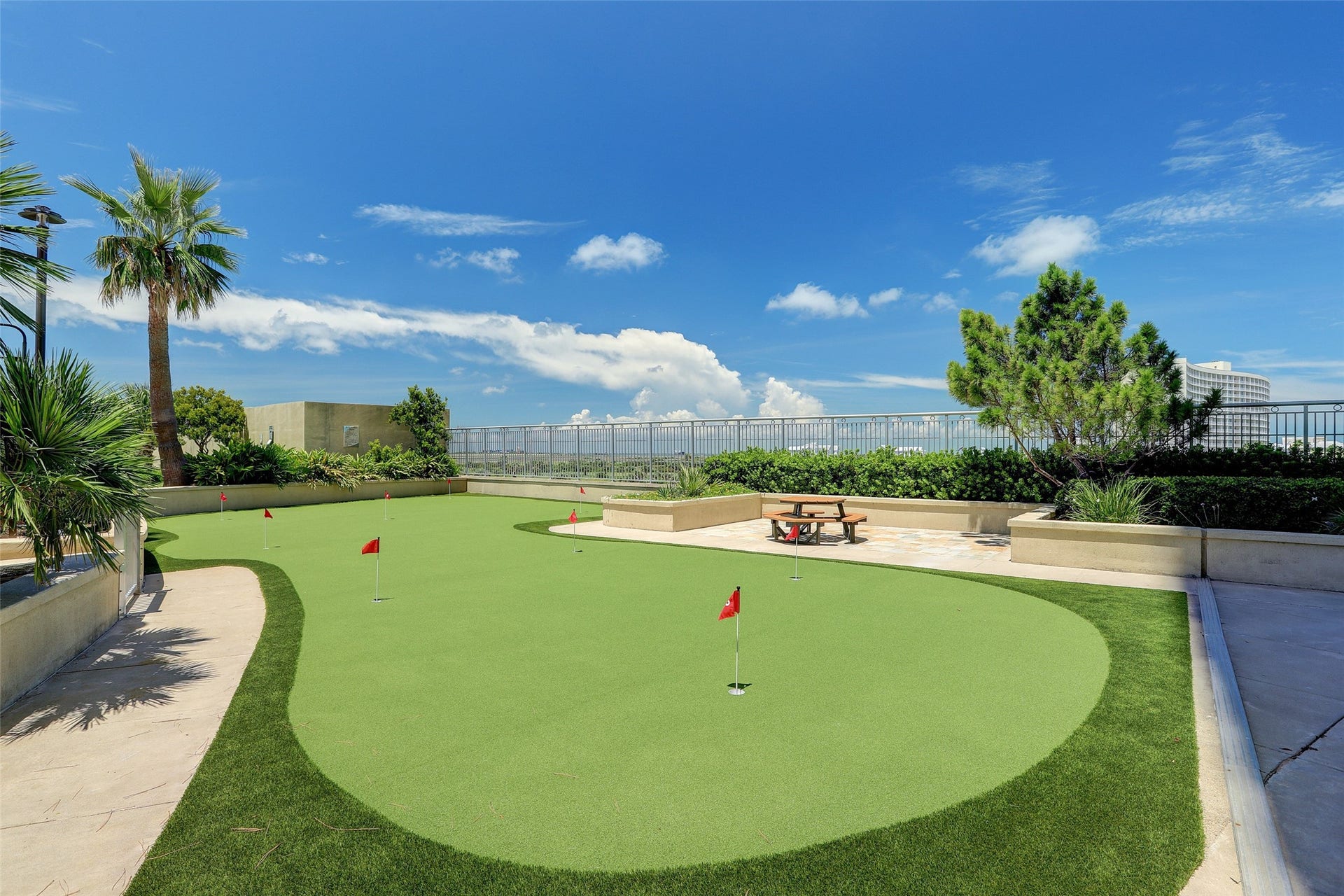 801 E Beach Drive, #BC2808, Galveston, TX 77550 Perfect for all ages, the putting green invites friendly competition and a chance to practice your short game beneath the coastal skyjust another way to enjoy everyday life at Palisade Palms
