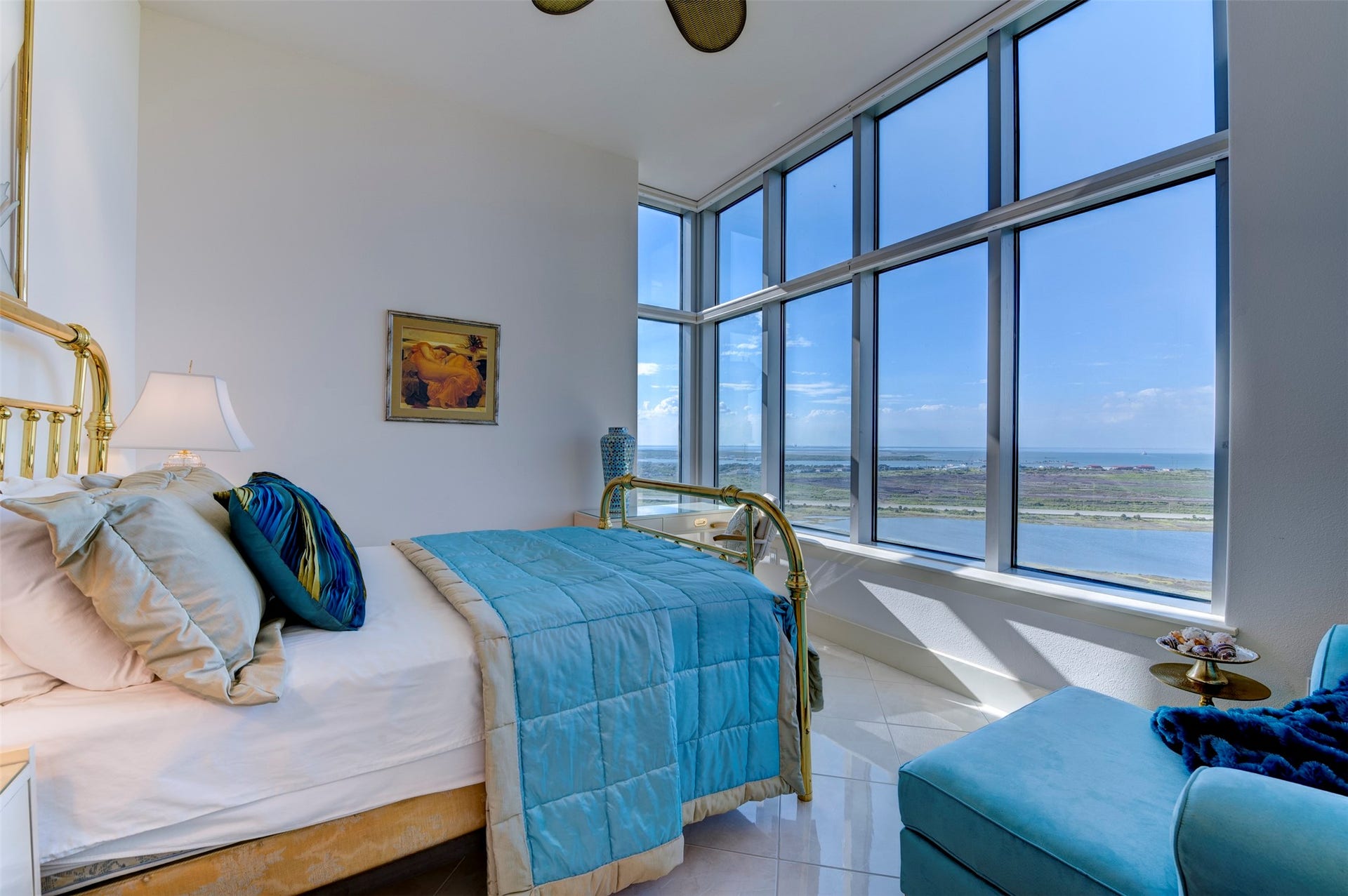 801 E Beach Drive, #BC2808, Galveston, TX 77550 Third bath features a large glass-enclosed shower with rainfall showerhead and pebble-stone floor.
