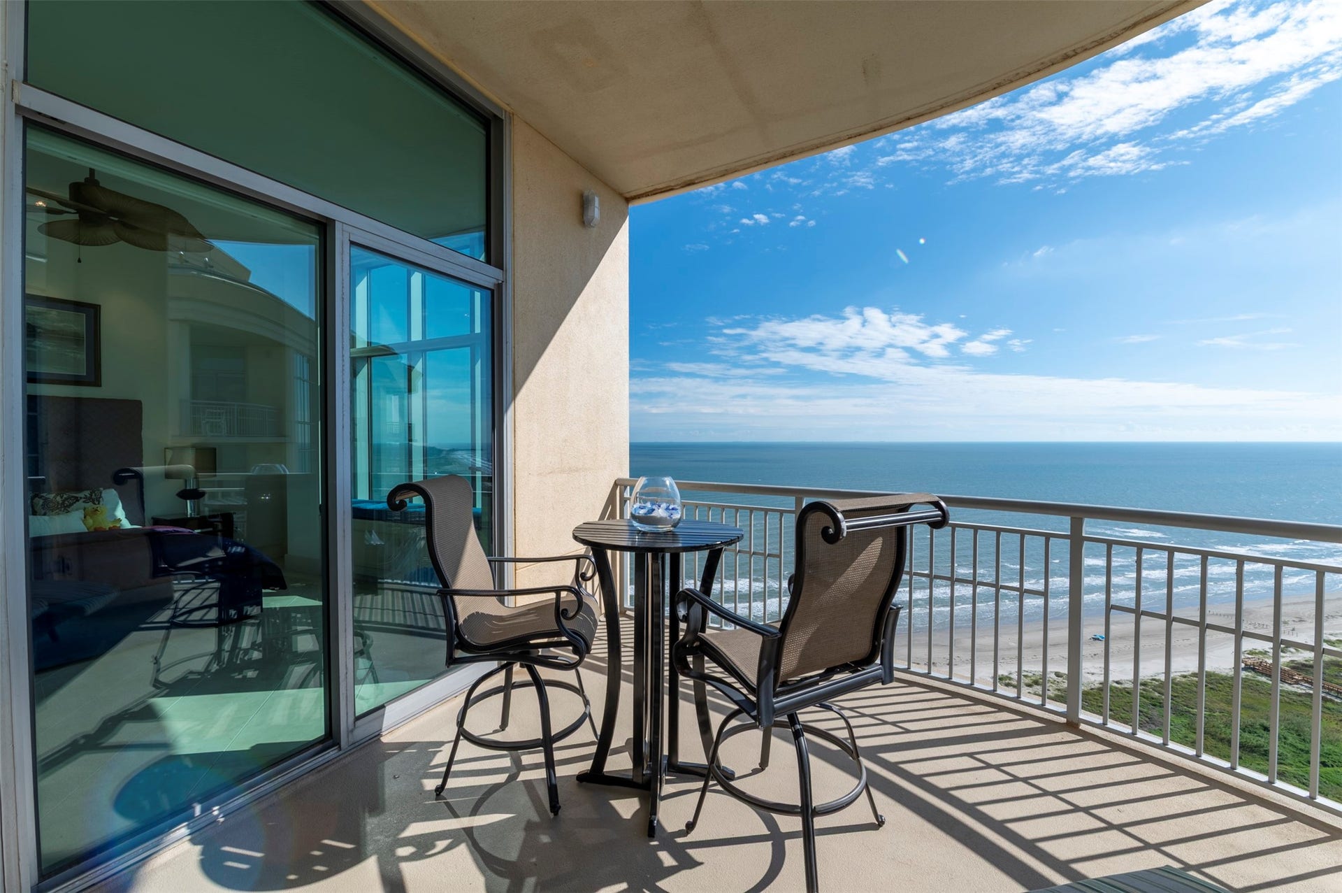 801 E Beach Drive, #BC2808, Galveston, TX 77550 Beach-facing balcony offers open Gulf views with direct access from the second primary suite