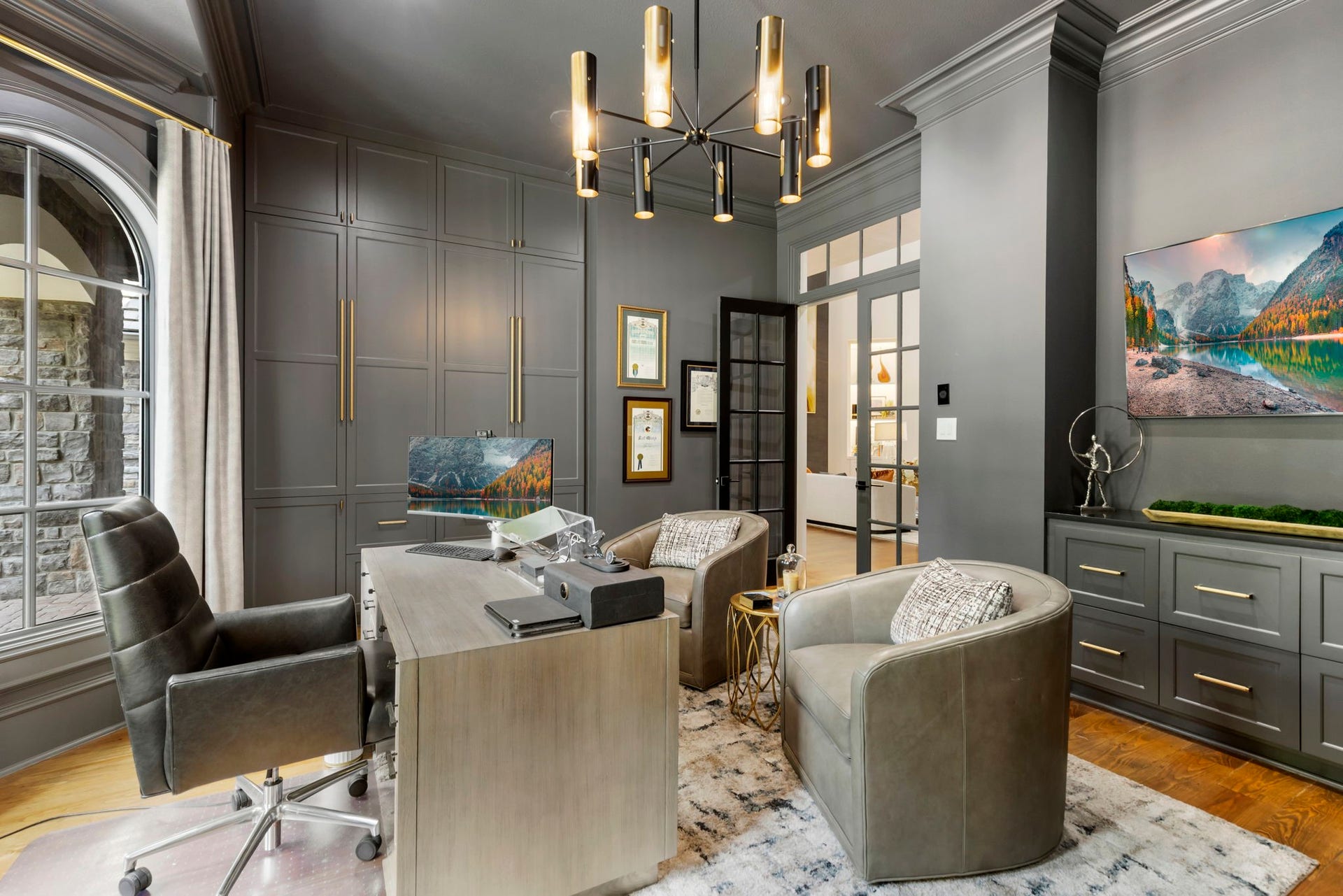 Built-in storage offering abundant concealed space for files & equipment keeps the room polished & uncluttered.