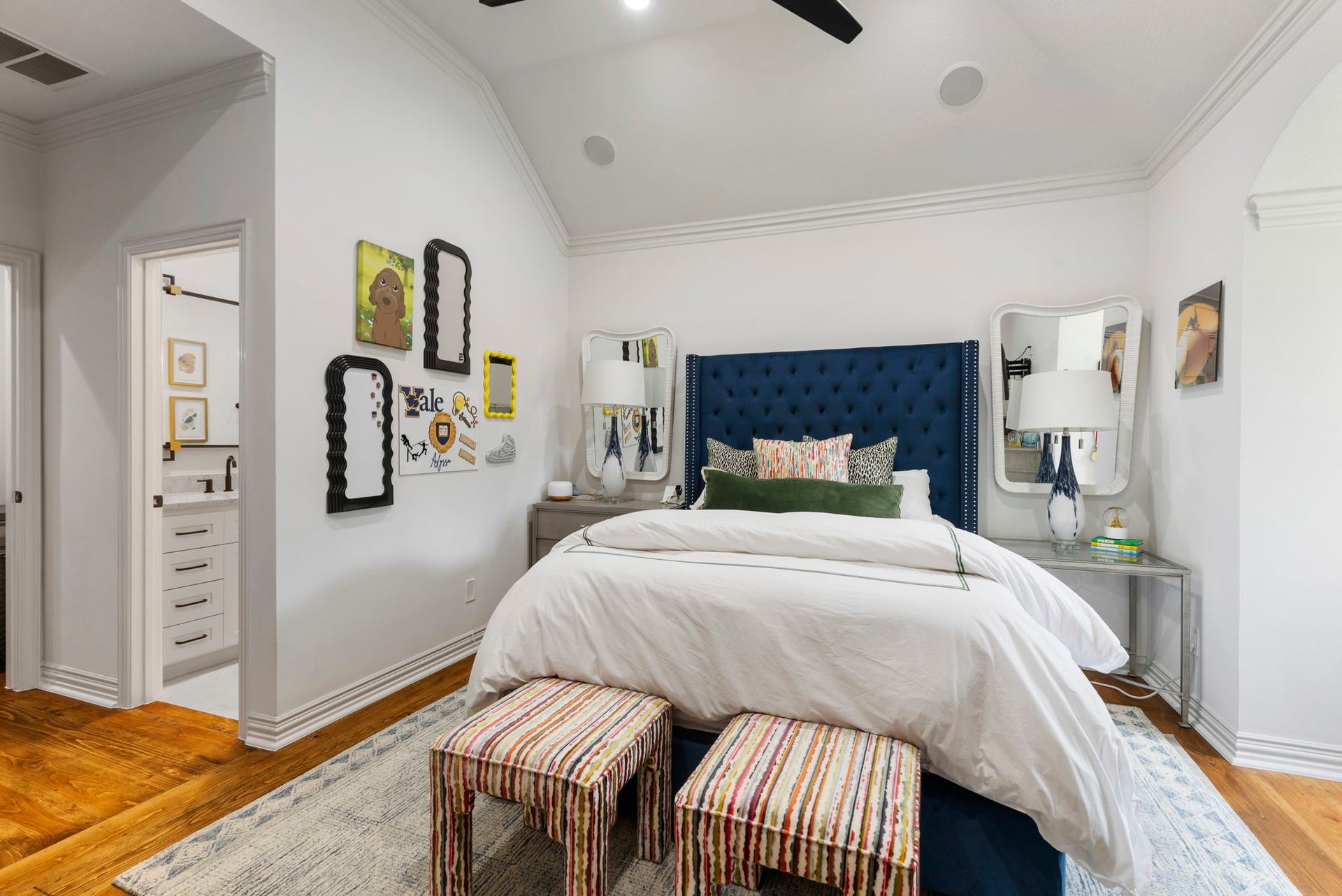 Three additional en suite bedrooms are located on the second floor.