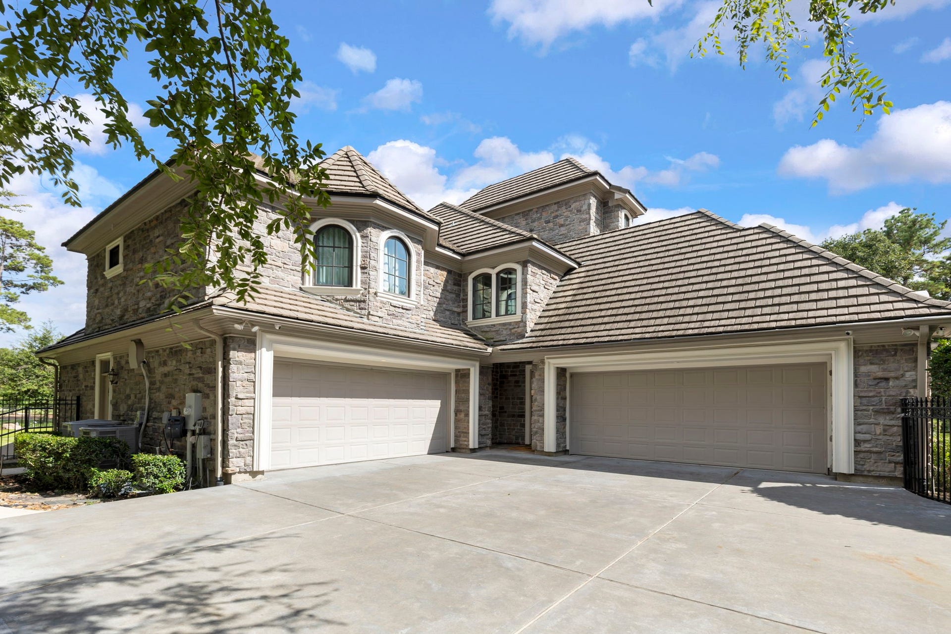 An extended driveway provides additional parking.