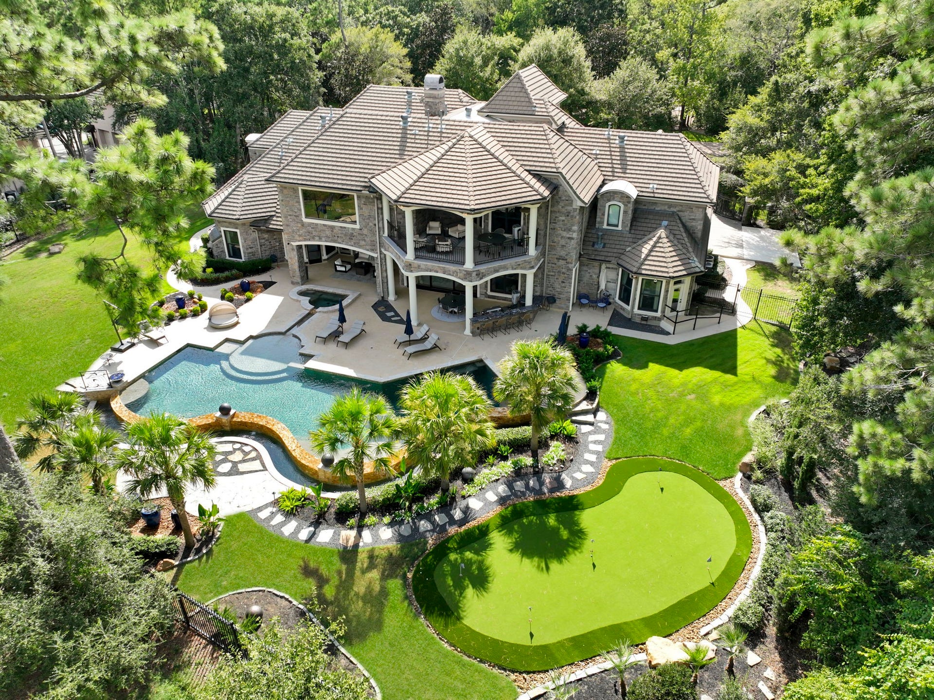 Quiet Luxury on the Fairway! Welcome to elevated luxury living in Carlton Woods.