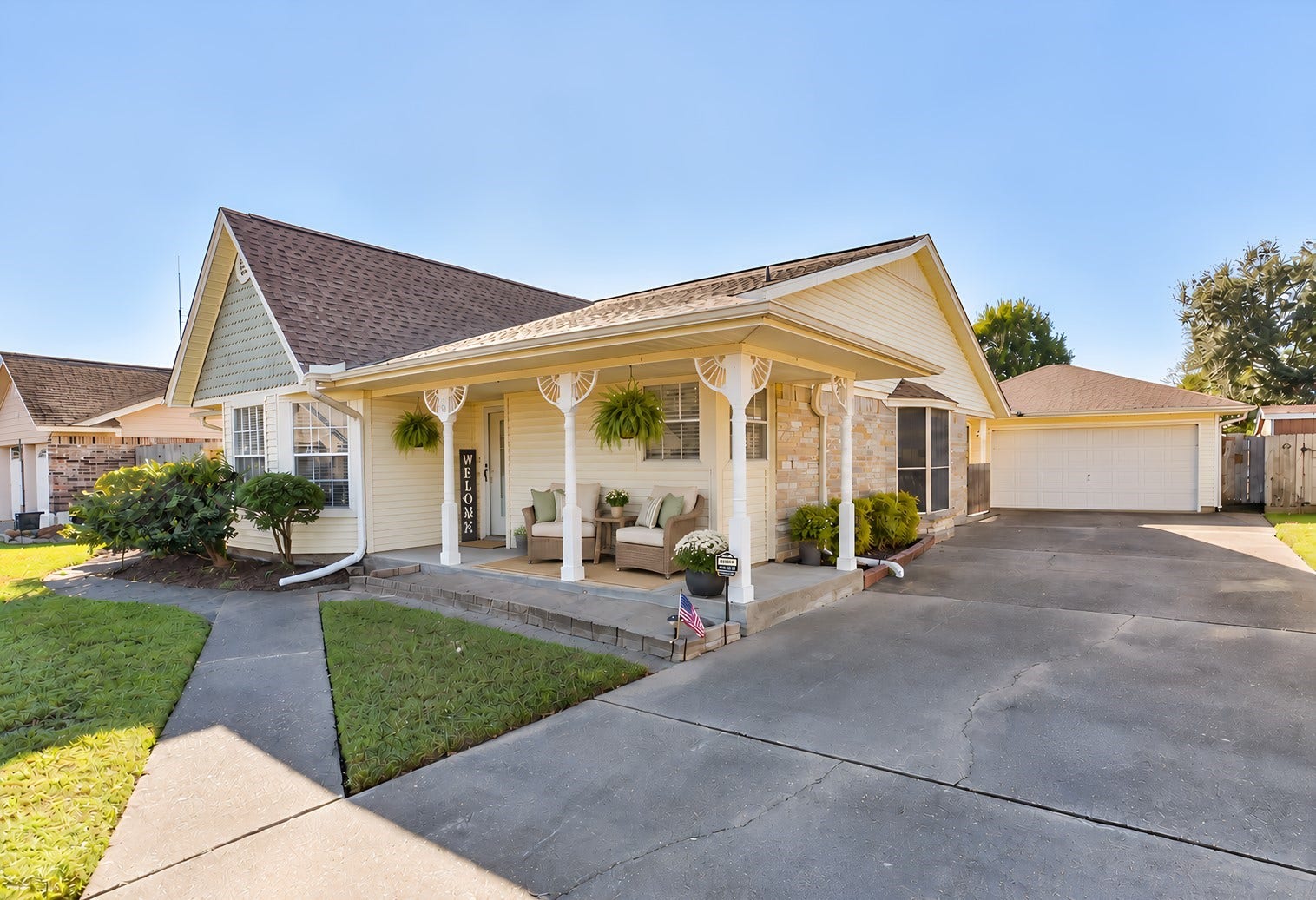 601 Kimswick C Court, Deer Park, TX 77536 This staged front porch is a perfect place to spend quiet mornings with a cup of coffee, or after a long day at work, you can unwind in the cool evening watching the sun go down.