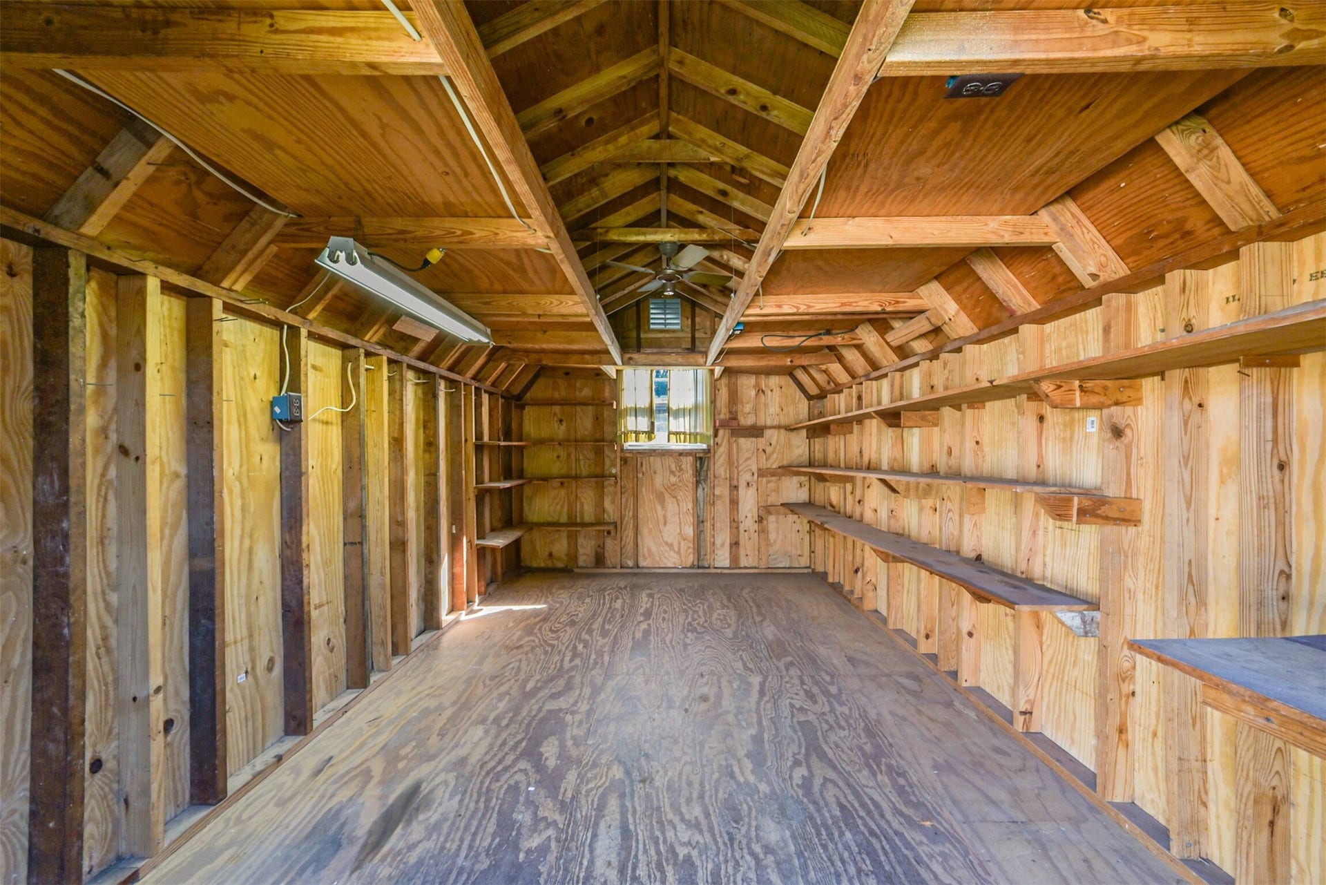 601 Kimswick C Court, Deer Park, TX 77536 Built-in shelving, ventilation, and lighting make this a great place for storage or a work space.
