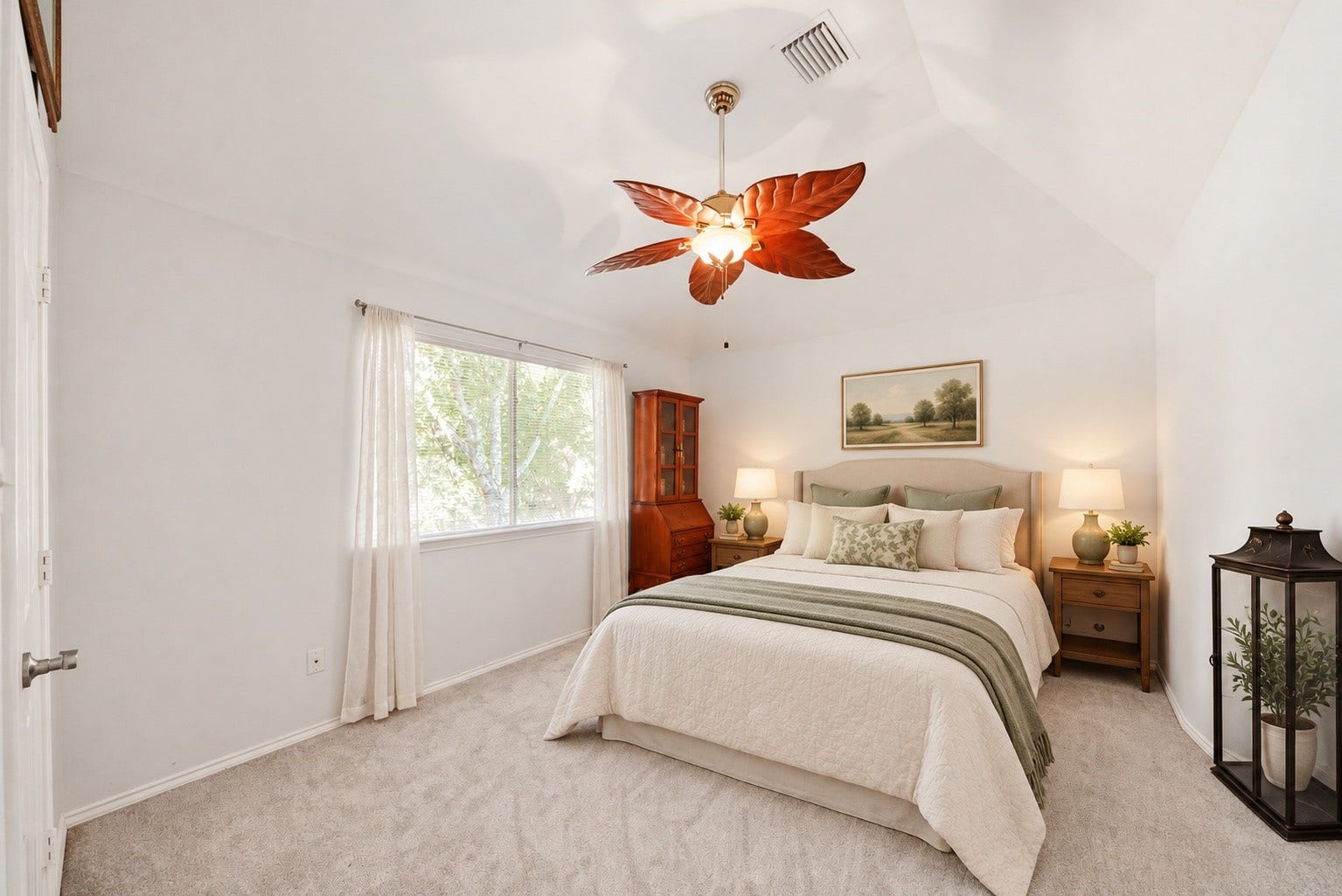 22510 Westenfield Lane, Katy, TX 77450 Virtually Staged: This secondary bedroom has been styled as a welcoming guest retreat. A vaulted ceiling and soft natural light create an inviting space for visitors to settle in and feel at home.