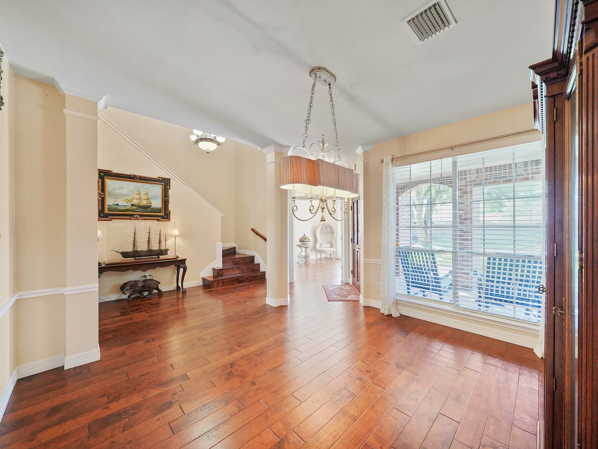 22510 Westenfield Lane, Katy, TX 77450 Just off the entry, the formal dining room offers an elegant setting for holidays, celebrations, and evenings around the table. A large window fills the room with natural light, while the wood flooring adds warmth.