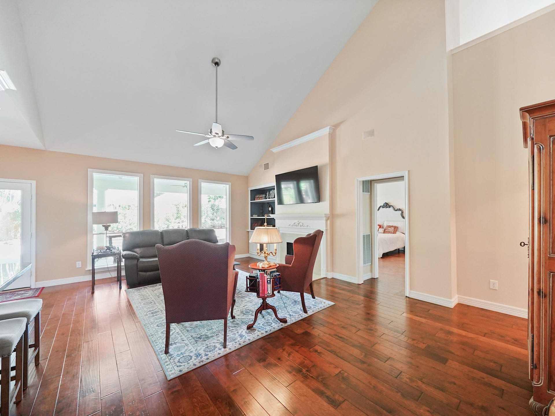 22510 Westenfield Lane, Katy, TX 77450 High ceilings and a wall of windows give the family room an airy, inviting feel. Theres plenty of room to settle in for a movie night or catch up with friends after dinner.