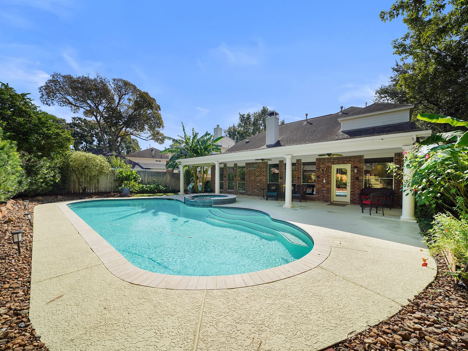 22510 Westenfield Lane, Katy, TX 77450 Enjoy a refreshing swim or settle into the attached spa as the day winds down. This backyard retreat brings a little vacation feeling home.