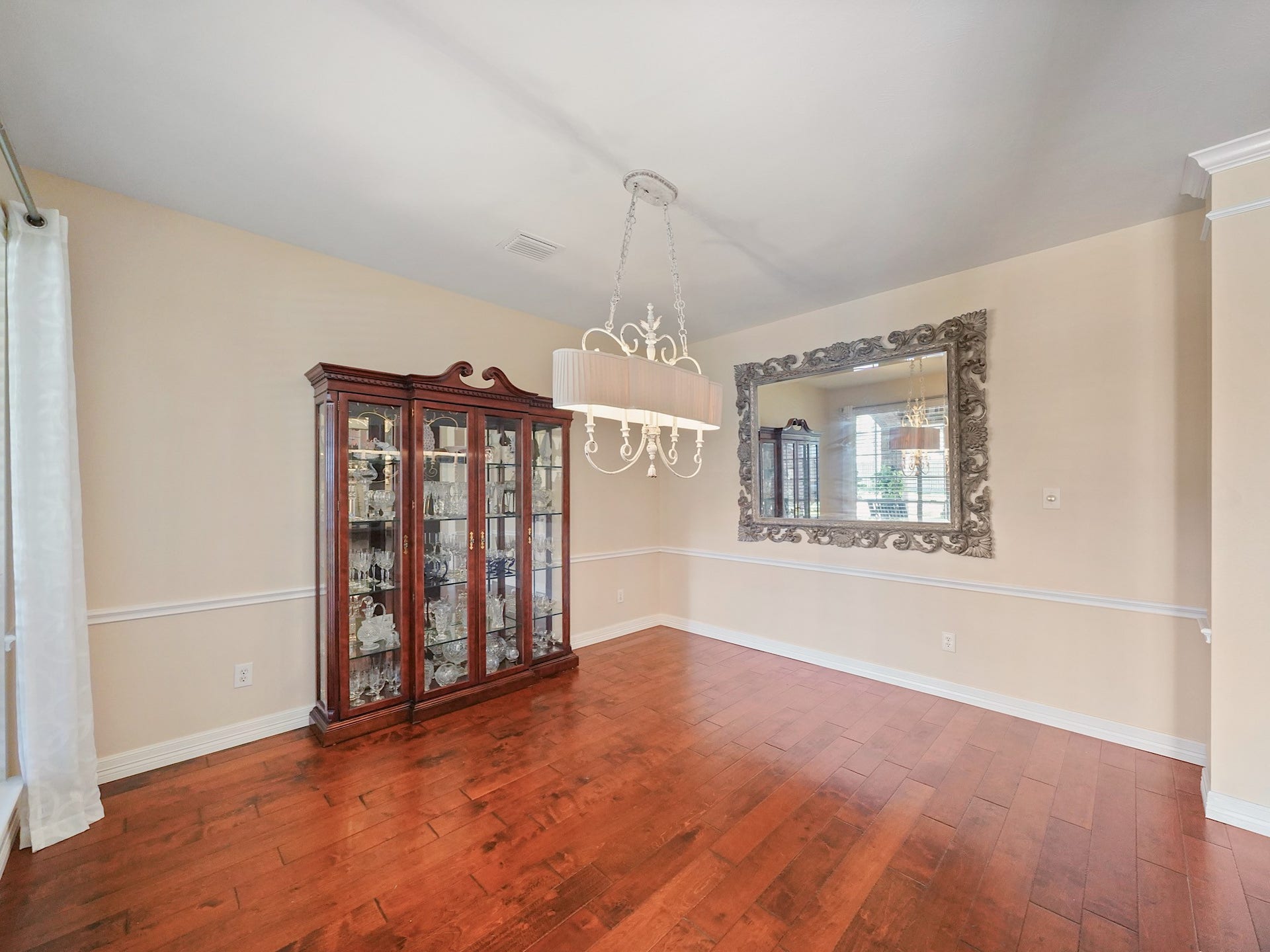 22510 Westenfield Lane, Katy, TX 77450 Whether hosting a special occasion or enjoying a quiet dinner, the formal dining room provides a lovely backdrop. Its open feel and warm flooring create a space ready to be made your own.