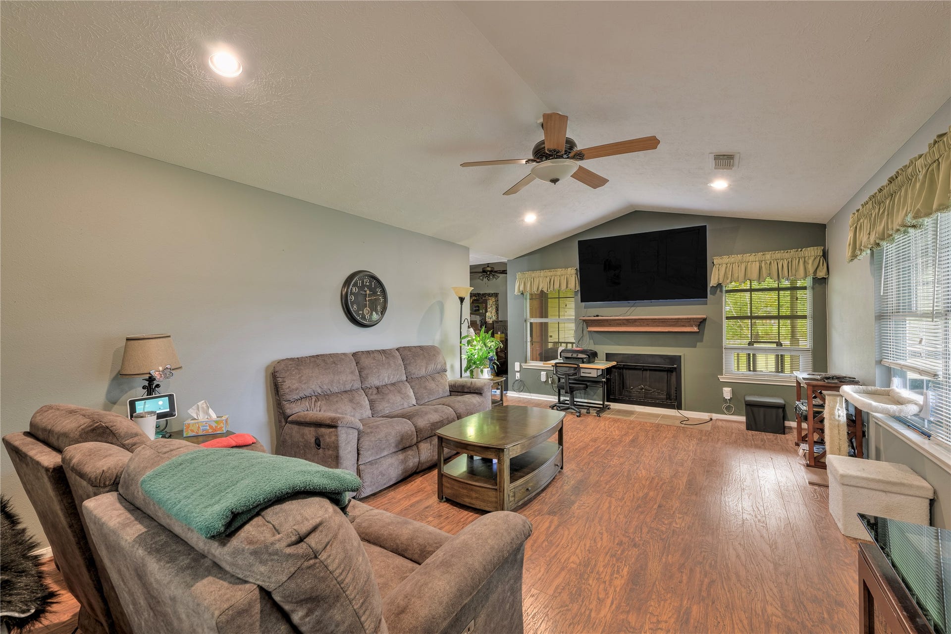 Living room off the front door to the right.