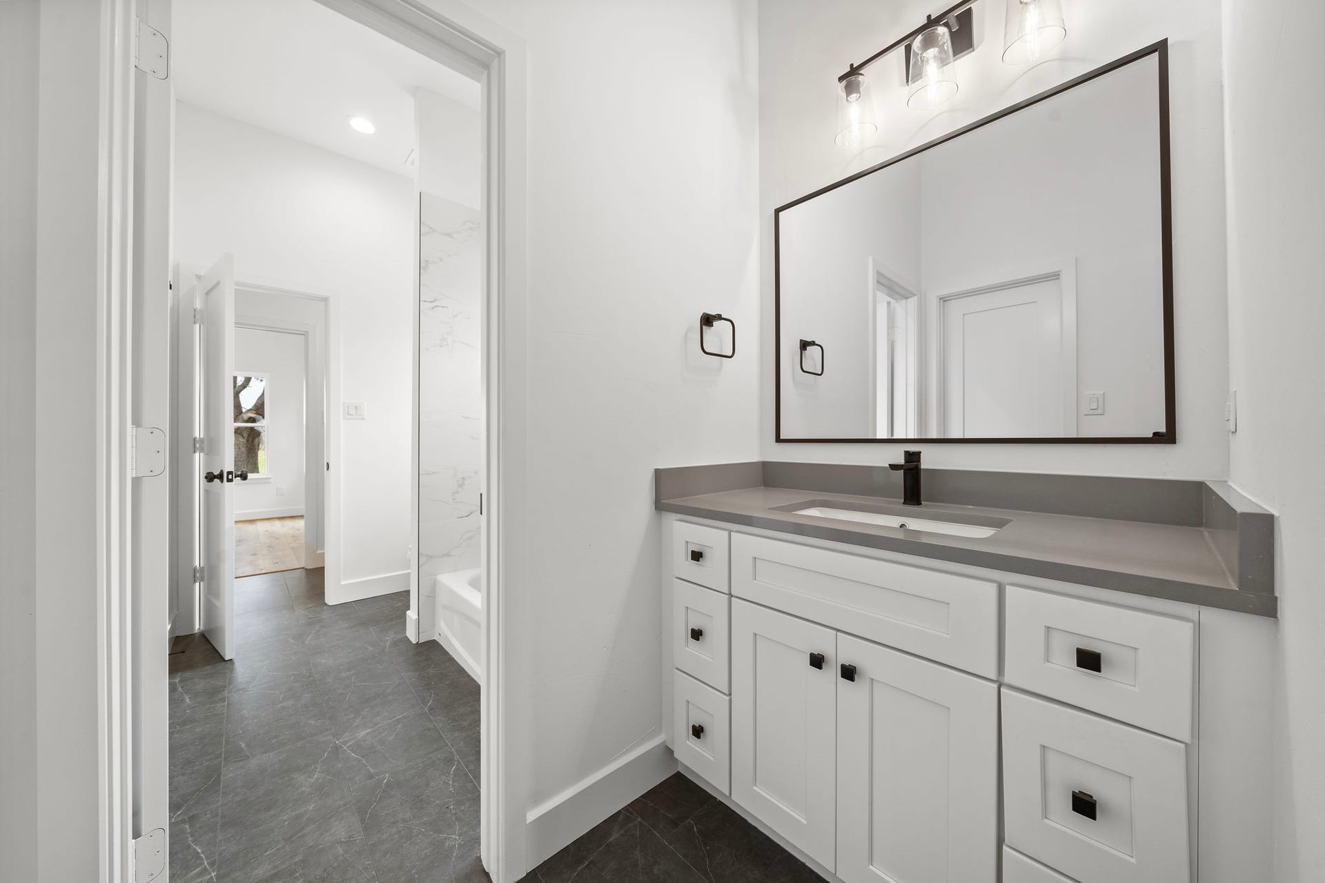 Private sink and storage for Secondary Bedroom 1 as well as a walk-in closet.