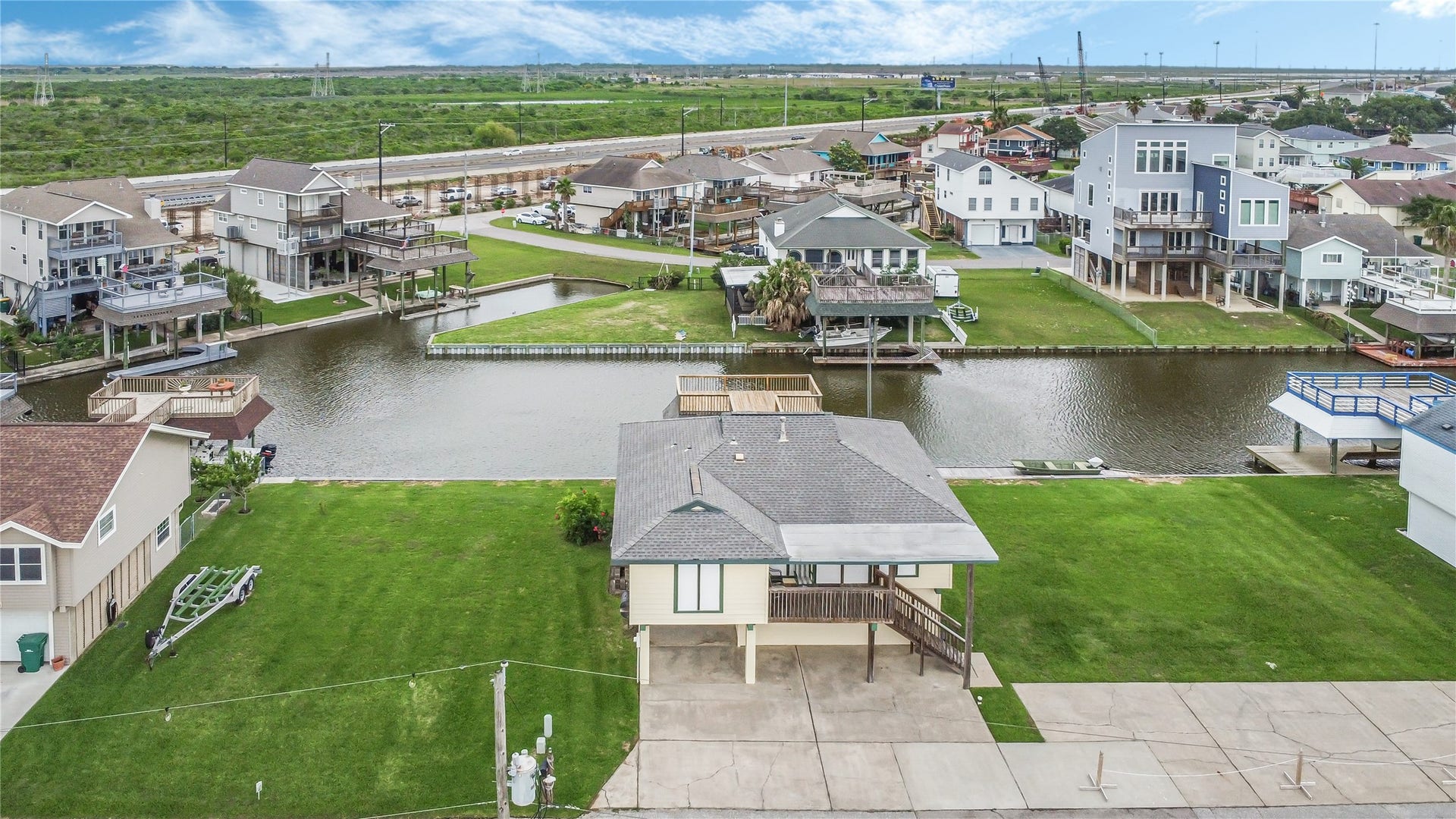 3 N White Heron Drive, La Marque, TX 77568 4500 Sq. Ft lot with water in front and back.