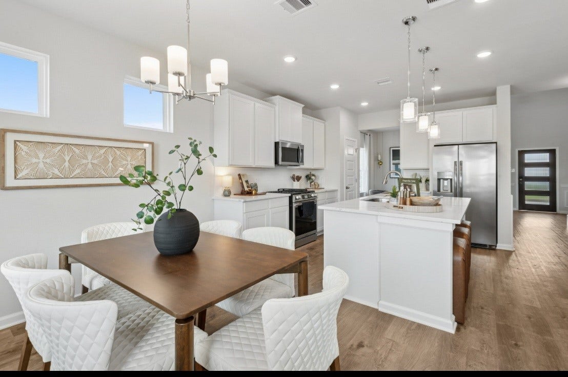 This image of the kitchen/breakfast is staged to be used for illustration purposes only.