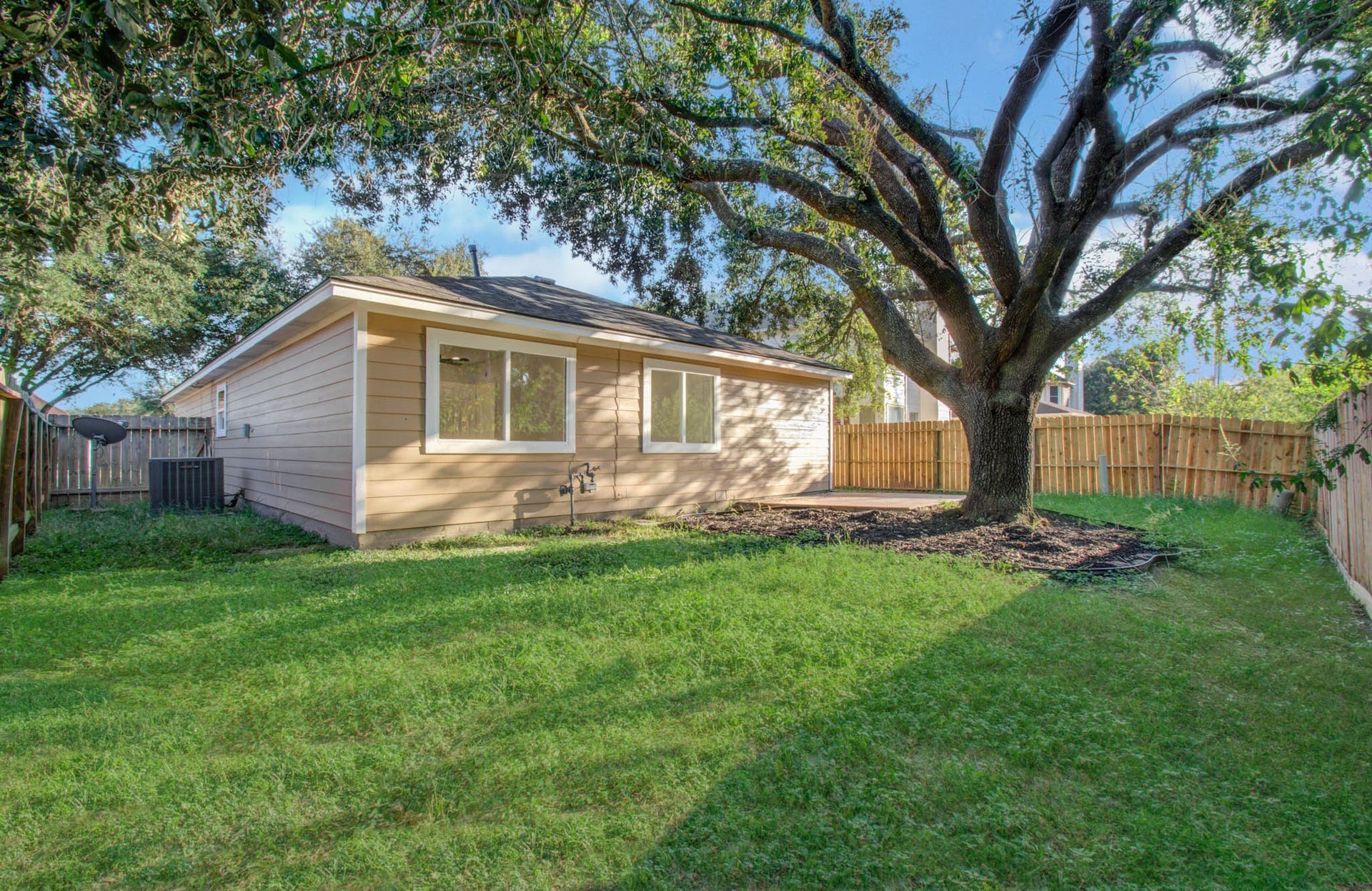 Fully fenced backyard with a patio,and no backyard neighbors!