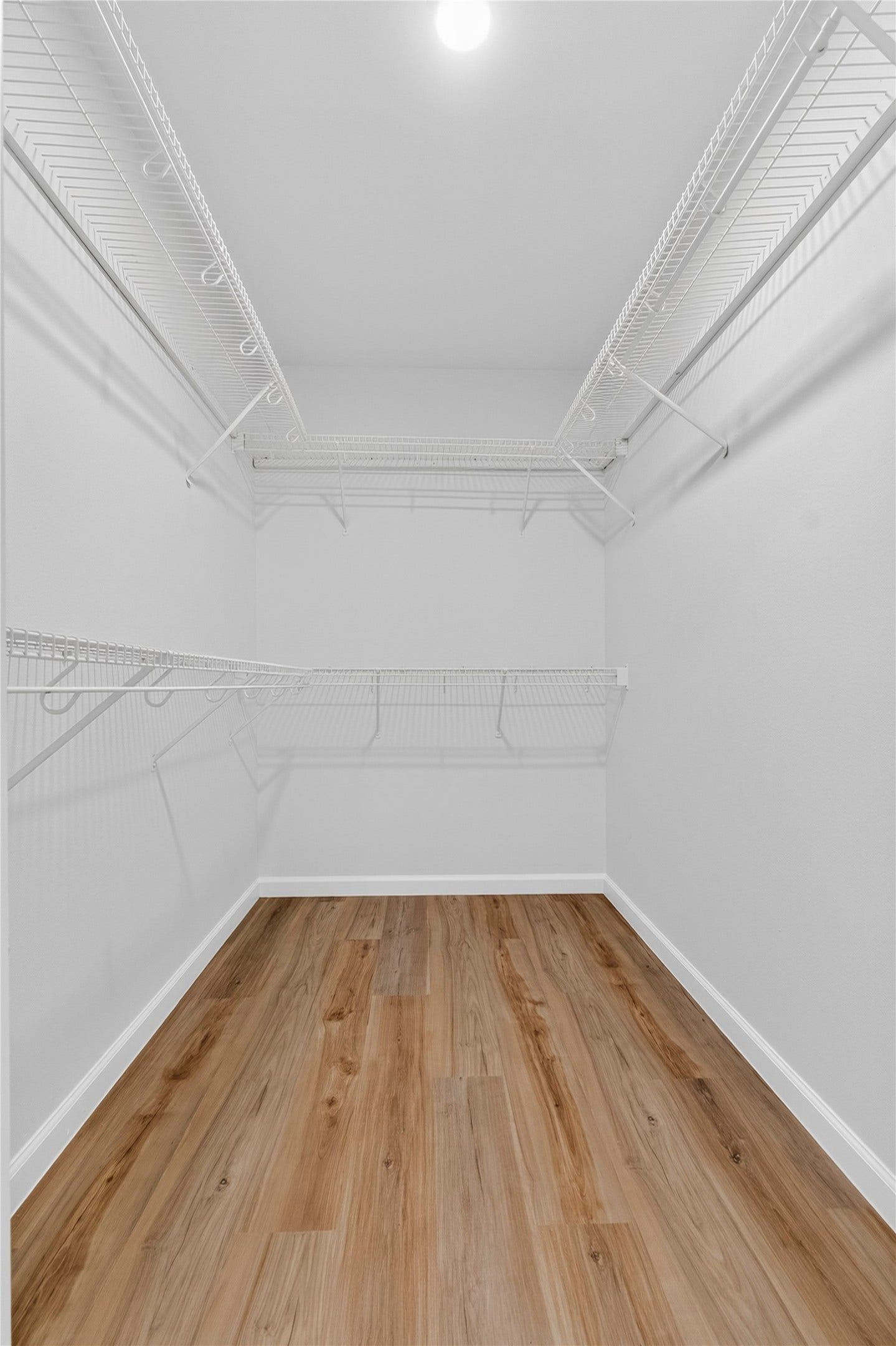 Primary Bedroom walk-in closet
