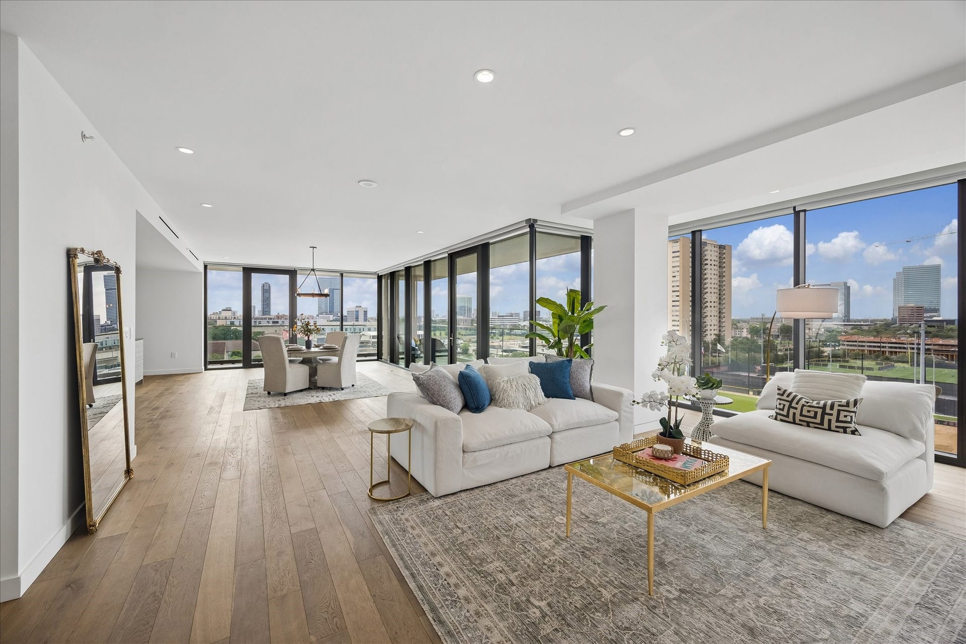 3433 Westheimer Road, #702, Houston, TX 77027 Welcome home - where floor-to-ceiling glass and sweeping city views create an unforgettable first impression! A 303-square-foot balcony, blending indoor luxury with spectacular outdoor views.