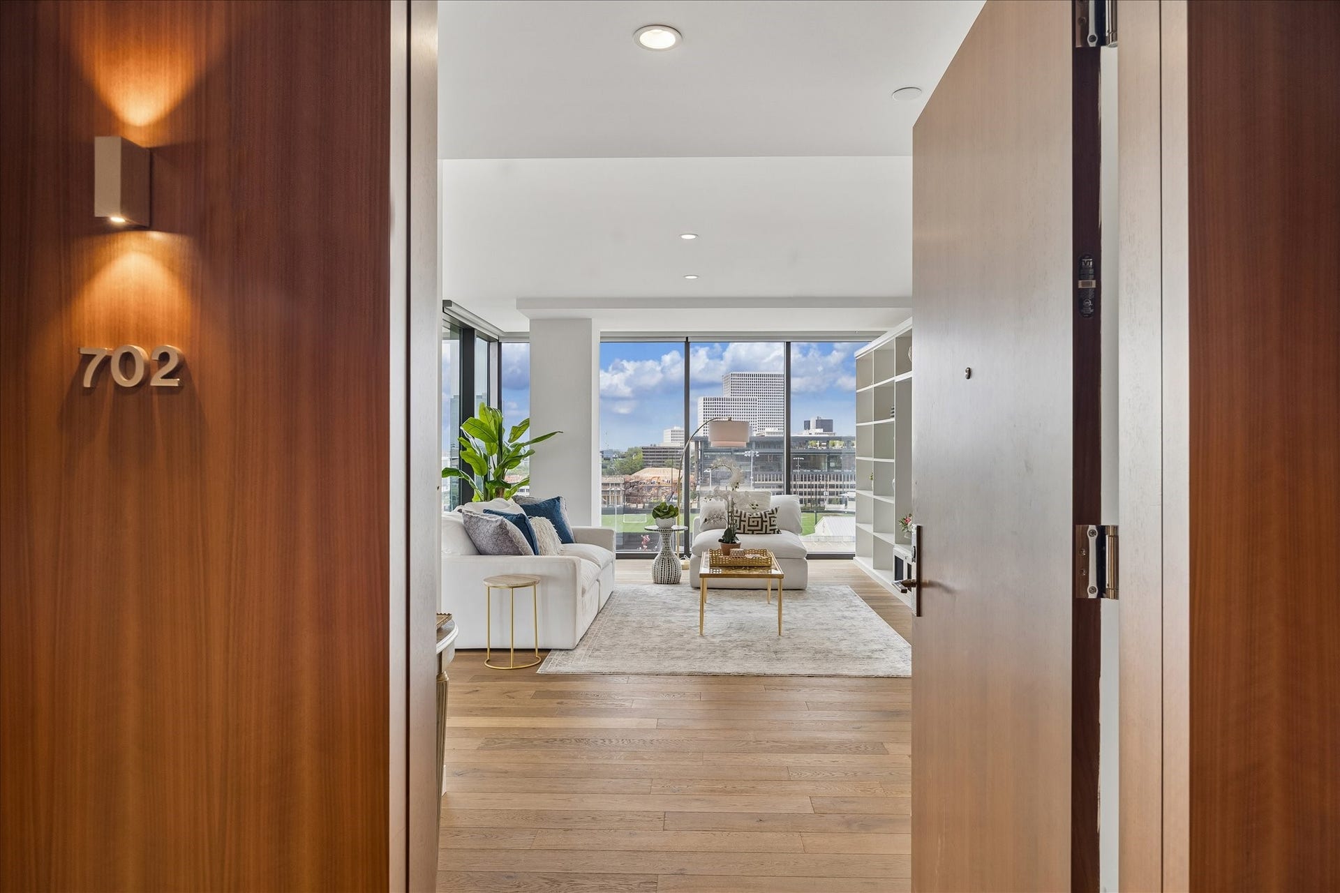 3433 Westheimer Road, #702, Houston, TX 77027 Welcome home - where floor-to-ceiling glass and sweeping city views create an unforgettable first impression!