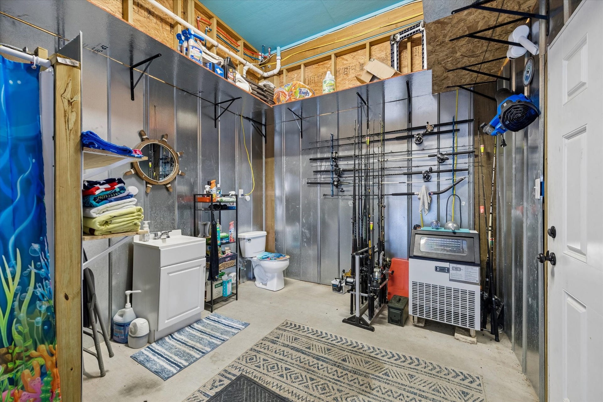 161 Four Master Road, Freeport, TX 77541 Spacious downstairs bathroom with ample storage, perfect for organizing essentials while enjoying convenience and functionality.