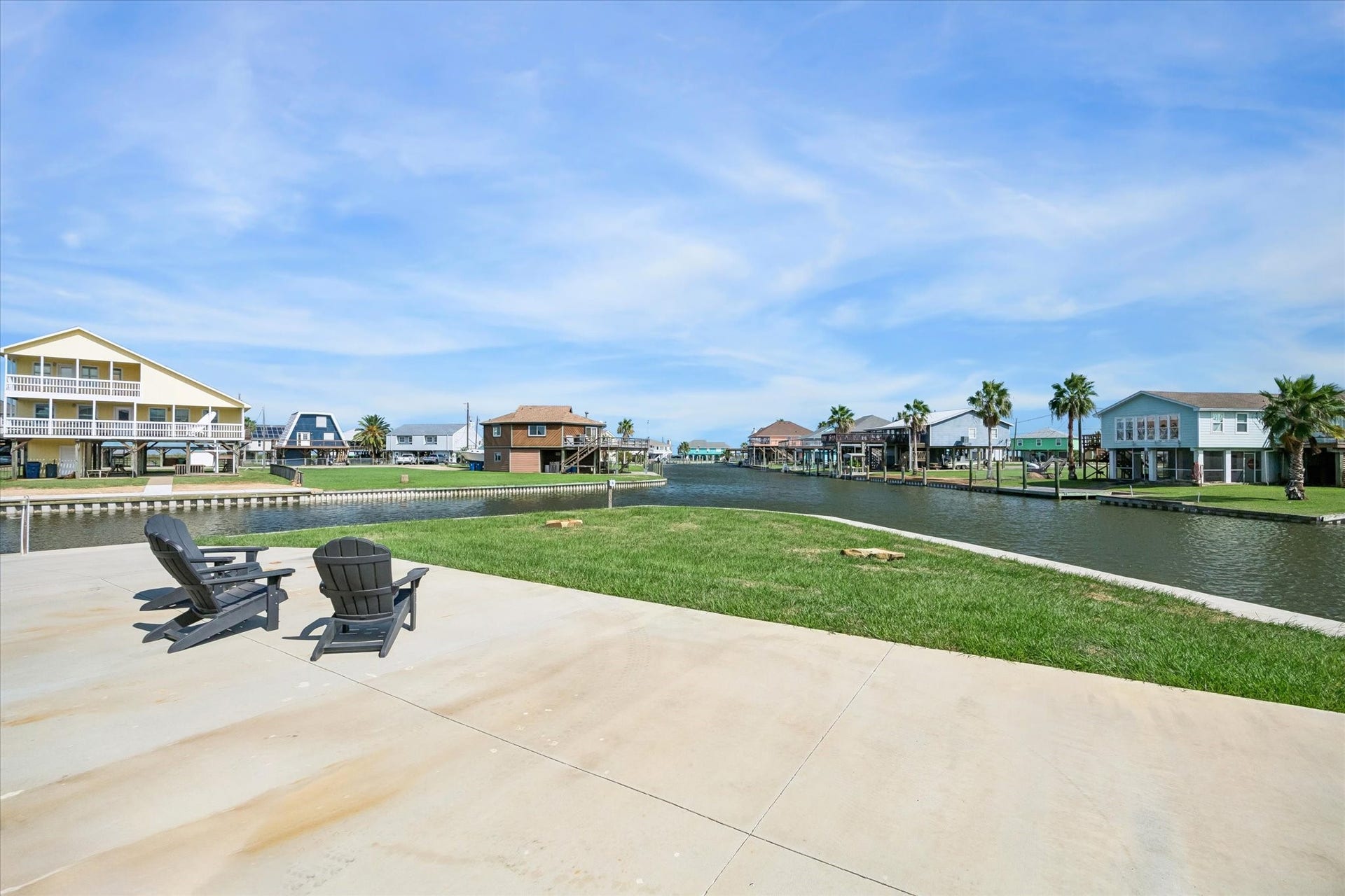 161 Four Master Road, Freeport, TX 77541 Enjoy serene waterfront 180 degree view with direct access to the canal, perfect for relaxing or outdoor activities.