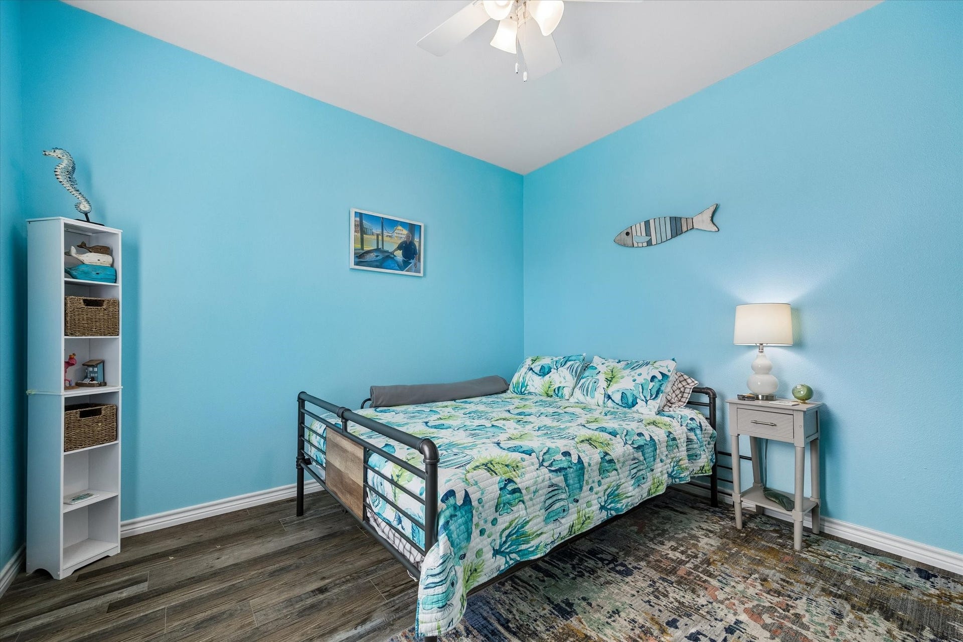 161 Four Master Road, Freeport, TX 77541 Experience coastal charm in Bedroom 2, featuring a vibrant design and the convenience of an en suite bath.