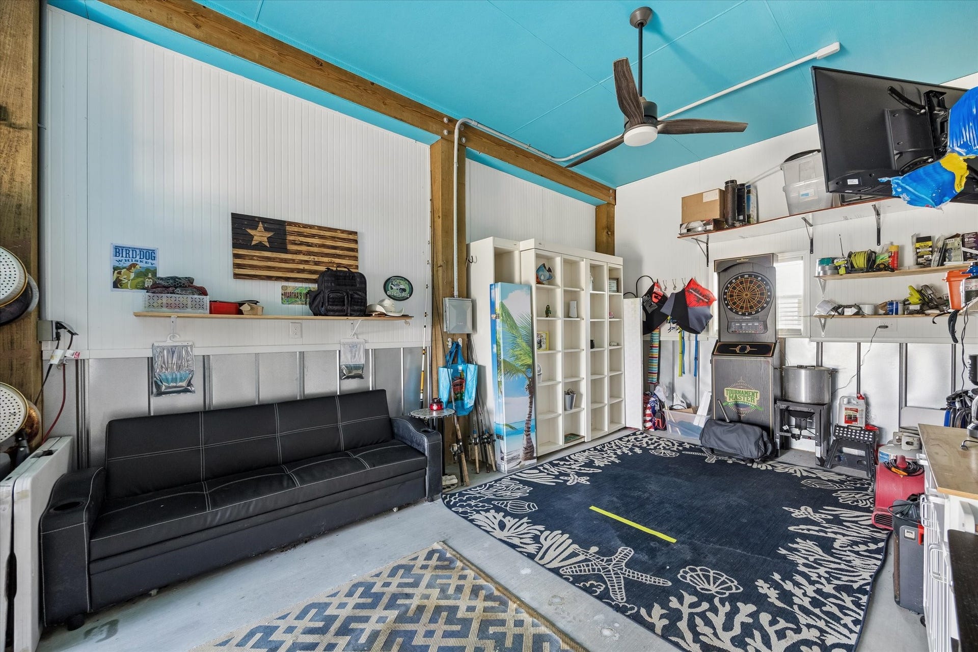 161 Four Master Road, Freeport, TX 77541 Versatile first-level space ideal for a lively game room, cozy sleeping quarters, or for extra storage and a golf cart!
