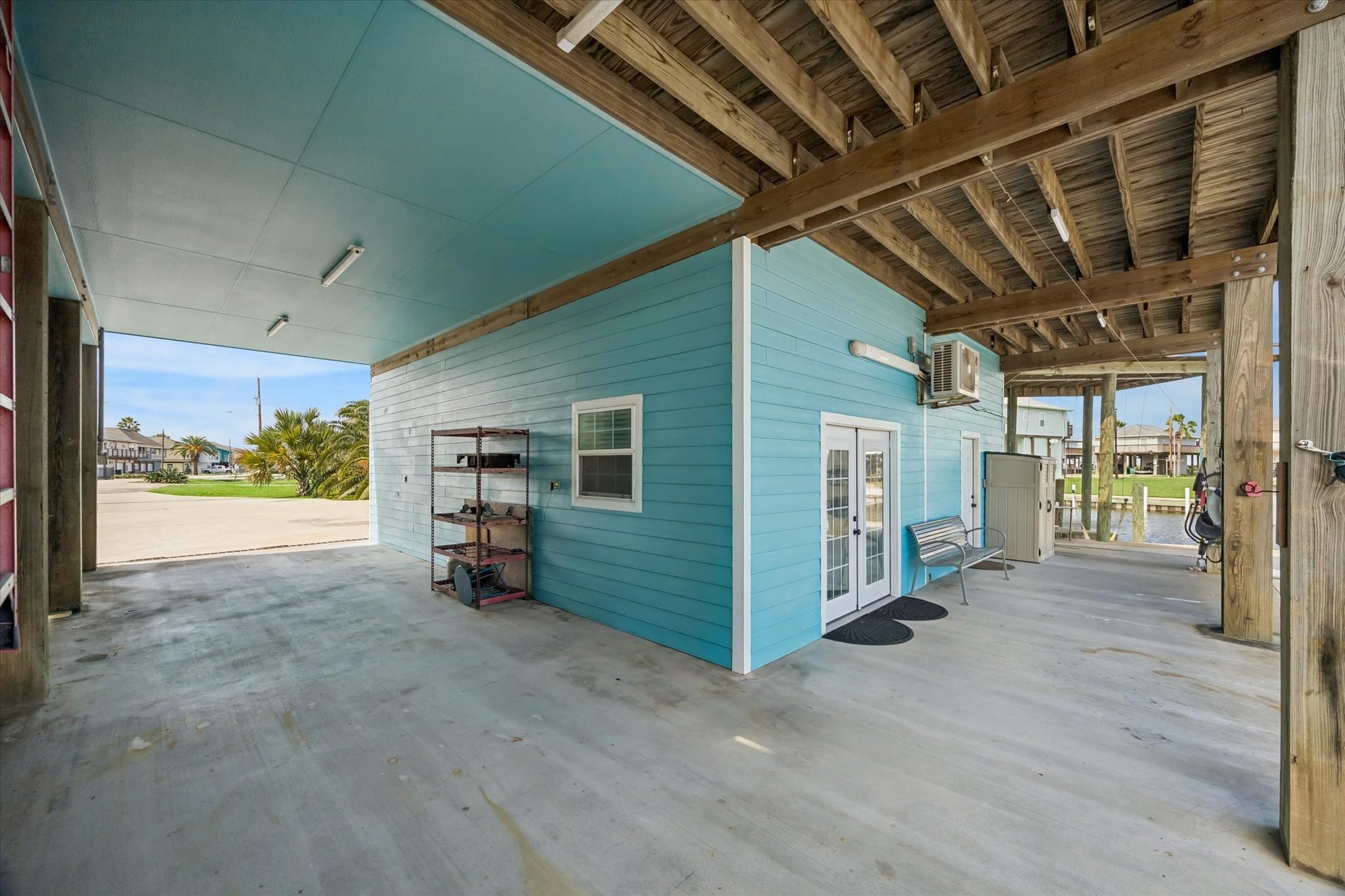 161 Four Master Road, Freeport, TX 77541 Charming coastal retreat with a spacious covered patio, perfect for relaxing by the water.