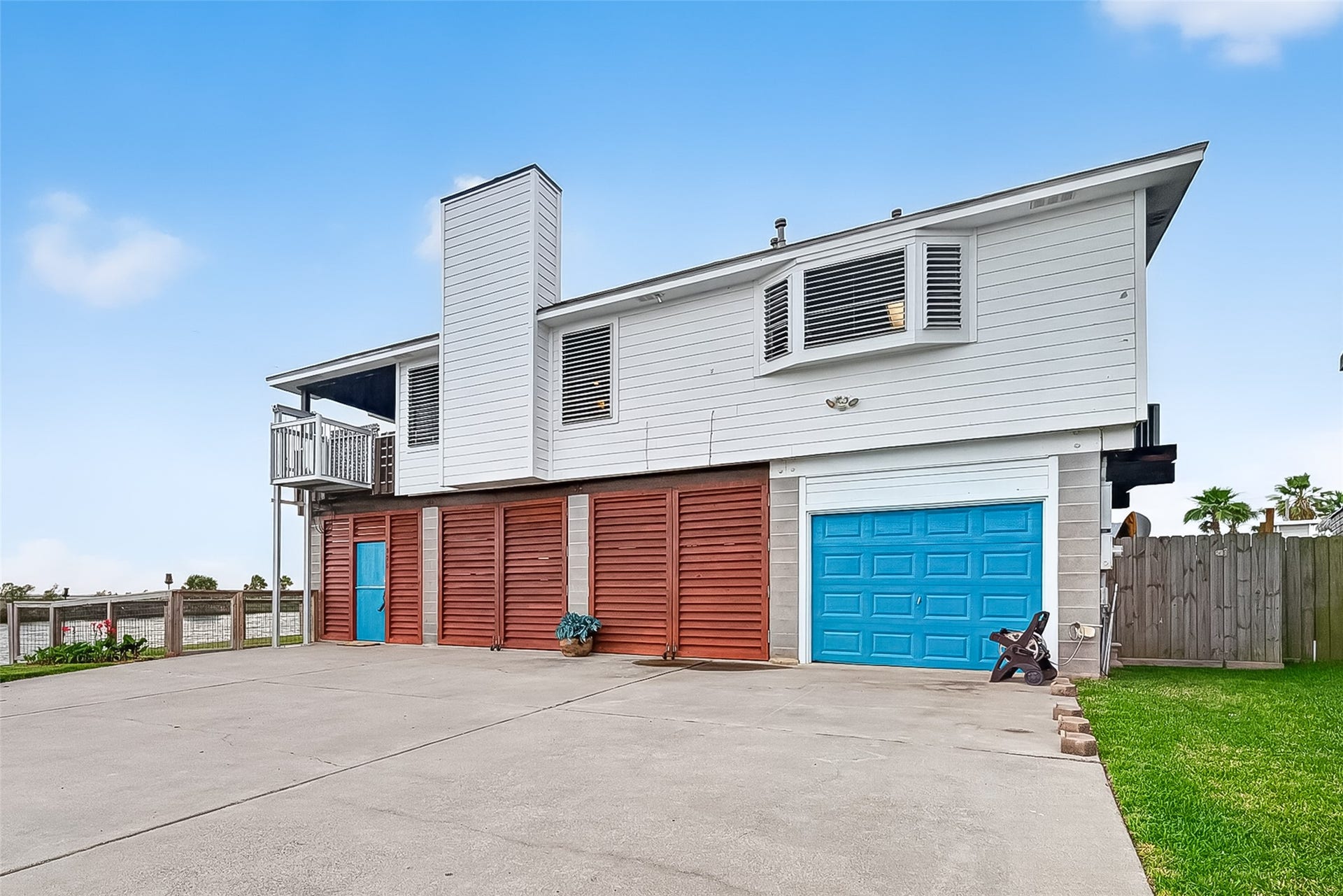 925 Bonita Street, Bayou Vista, TX 77563 Welcome home! Two car garage as well as covered parking behind both sets of louvers!
