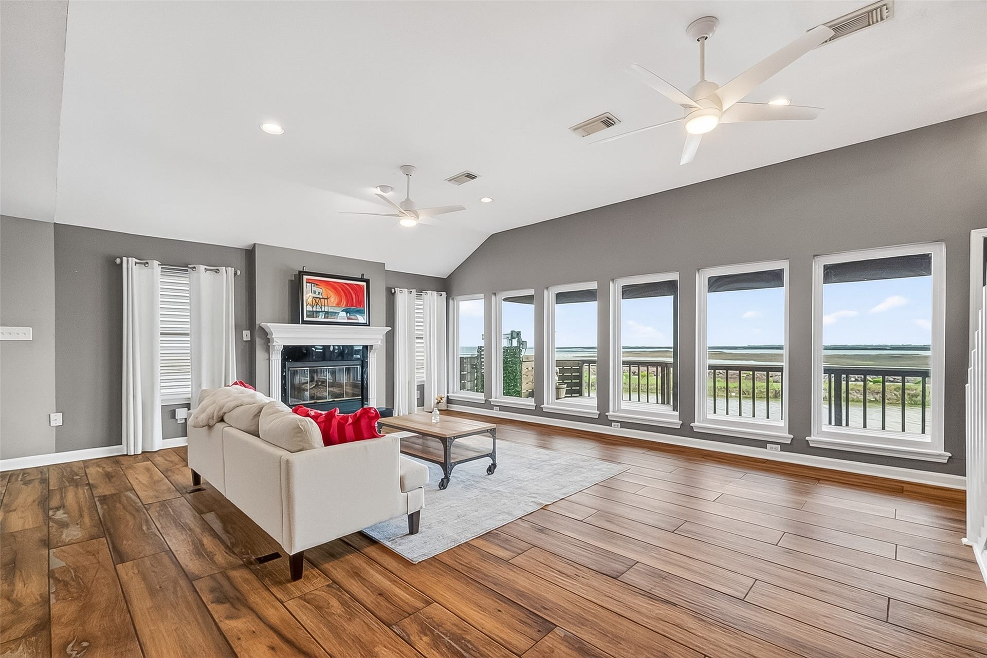 925 Bonita Street, Bayou Vista, TX 77563 WALL OF WINDOWS- great natural light in the open concept living room!