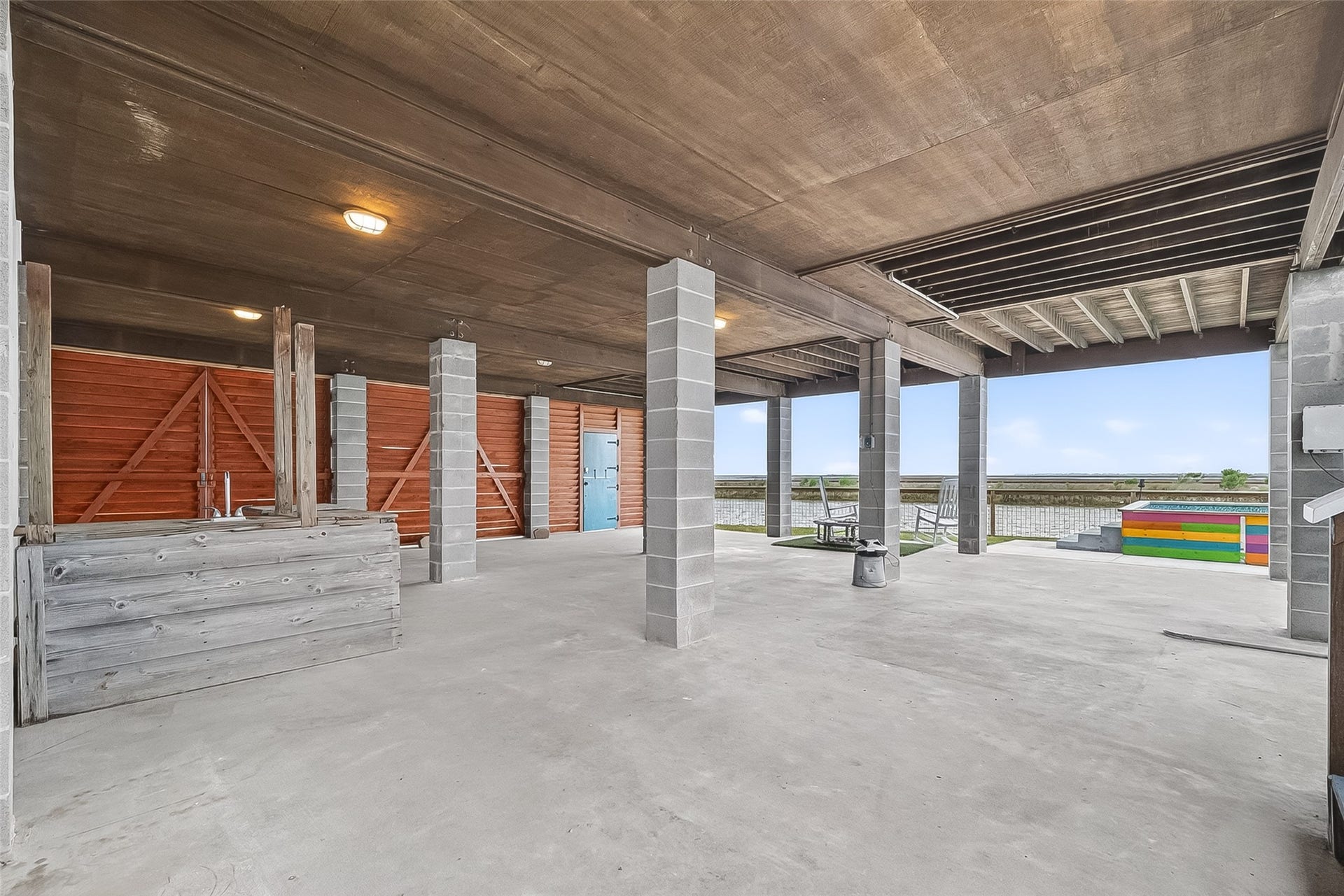 925 Bonita Street, Bayou Vista, TX 77563 Covered entertaining area or additional covered parking! Both sets of louvers open