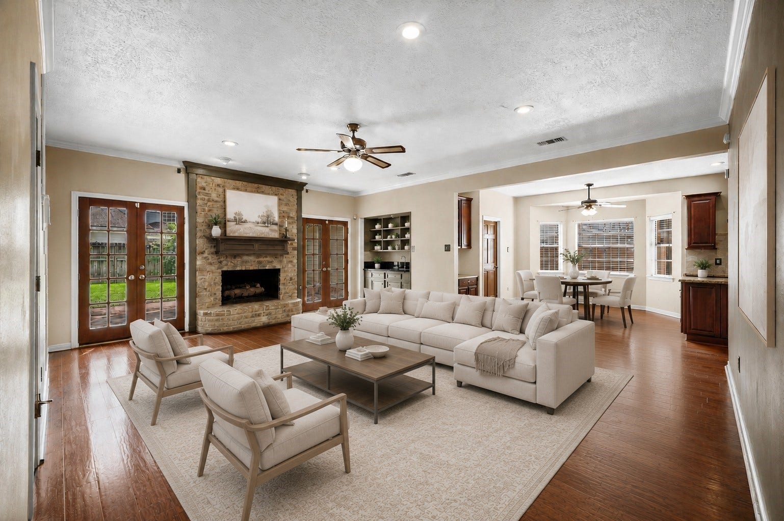 13126 Lemur Lane, Cypress, TX 77429 Photo is virtually staged to include furniture layout and decor possibilities. Additional shelving virtually added over wet bar for design inspiration.
