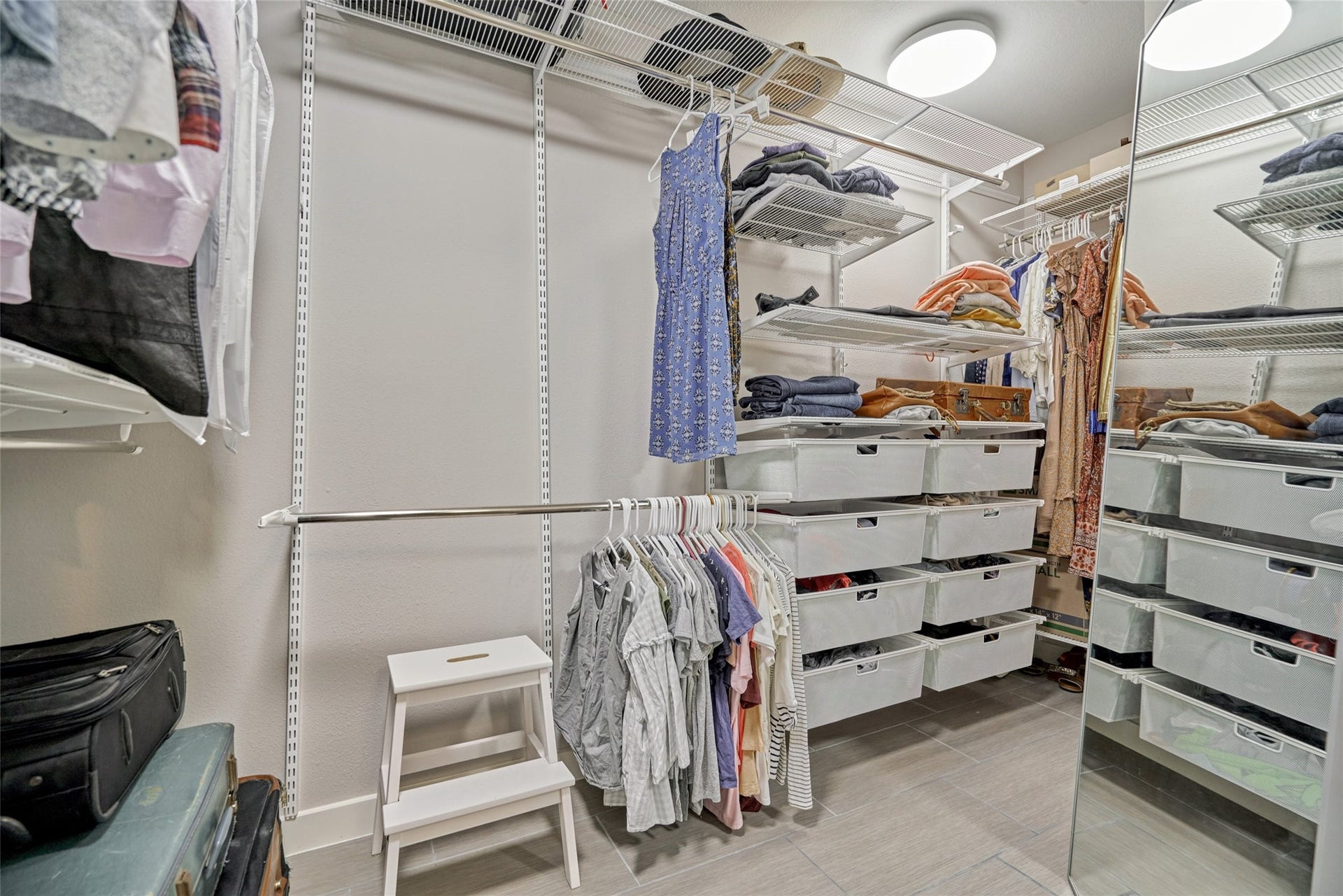 38 E Gaslight Place, The Woodlands, TX 77382 The Elfa closet system in the primary bedroom. Lots of space and storage here!