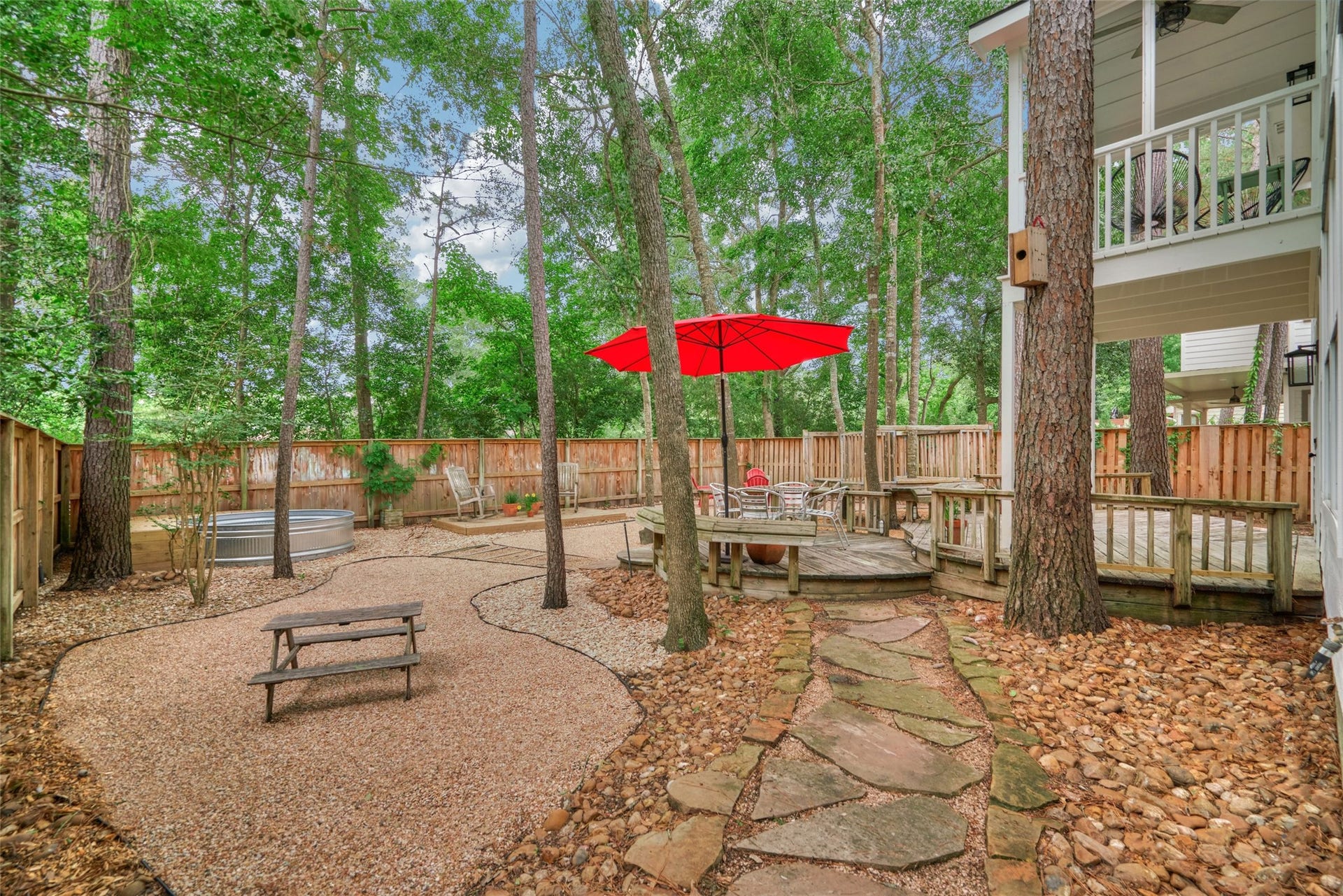 38 E Gaslight Place, The Woodlands, TX 77382 The home has a low maintenance and spacious backyard! Plenty of room for the pool and spa here too!