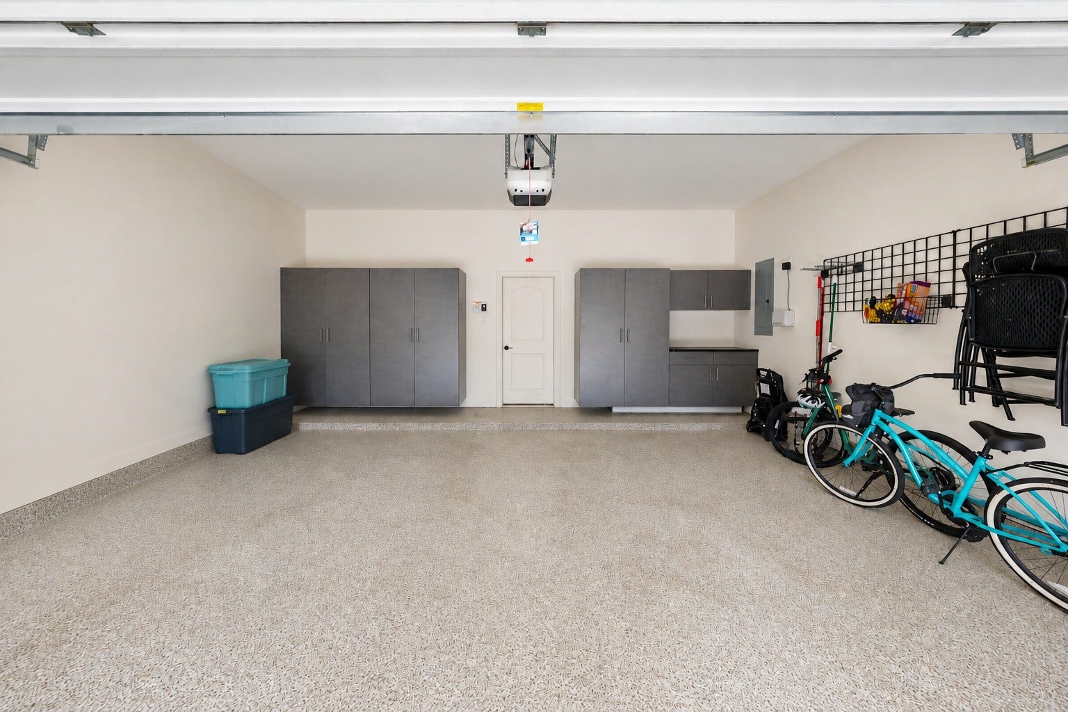 10 Camplight Court, Spring, TX 77389 2 Car Garage also with yet more storage and 2 hanging racks above Garage Door too.