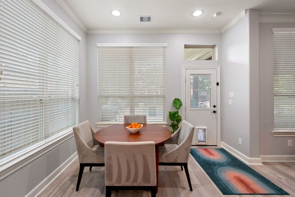 10 Camplight Court, Spring, TX 77389 Walls of windows overlooking the Outdoor Kitchen and Pool.