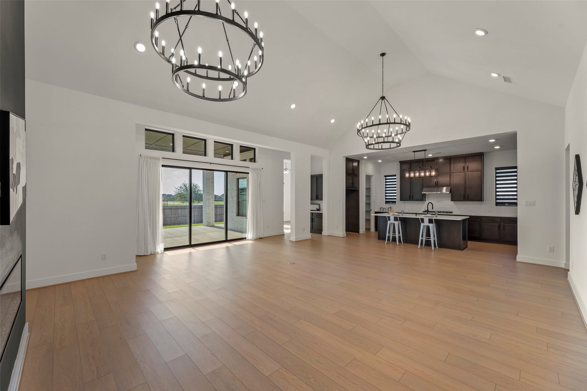 2015 Jade Manor Drive, Rosenberg, TX 77469 Abundant natural light from large sliding doors leading to the backyard in the living area.