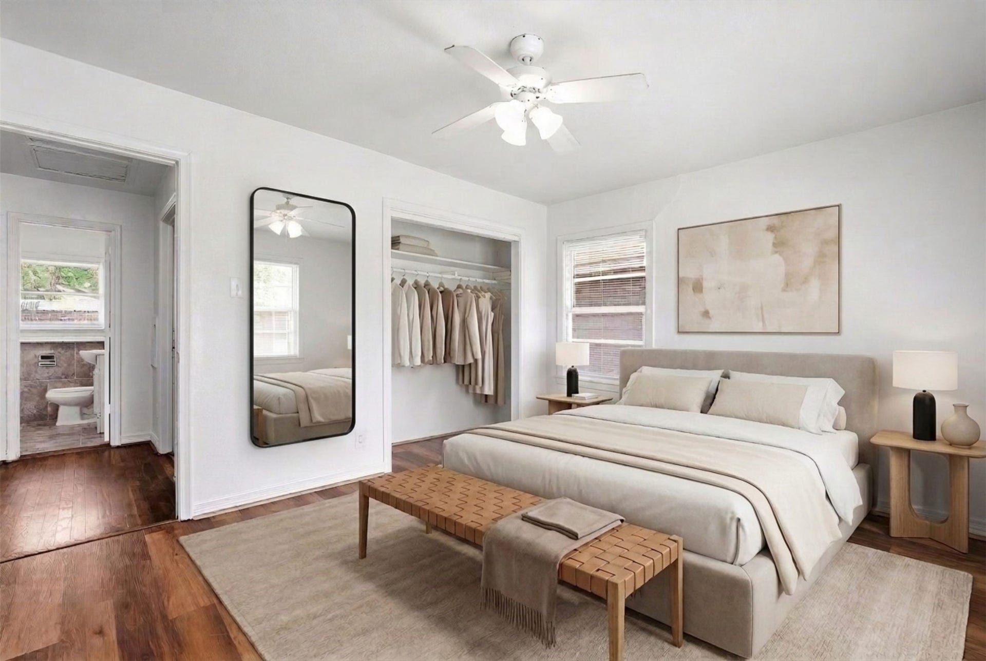 6630 Maybank Drive, Houston, TX 77055 Experience the perfect blend of elegance and comfort in this bedroom, featuring stylish decor, and abundant natural light, seamlessly connected to a chic en-suite bathroom. (Virtual Staging)