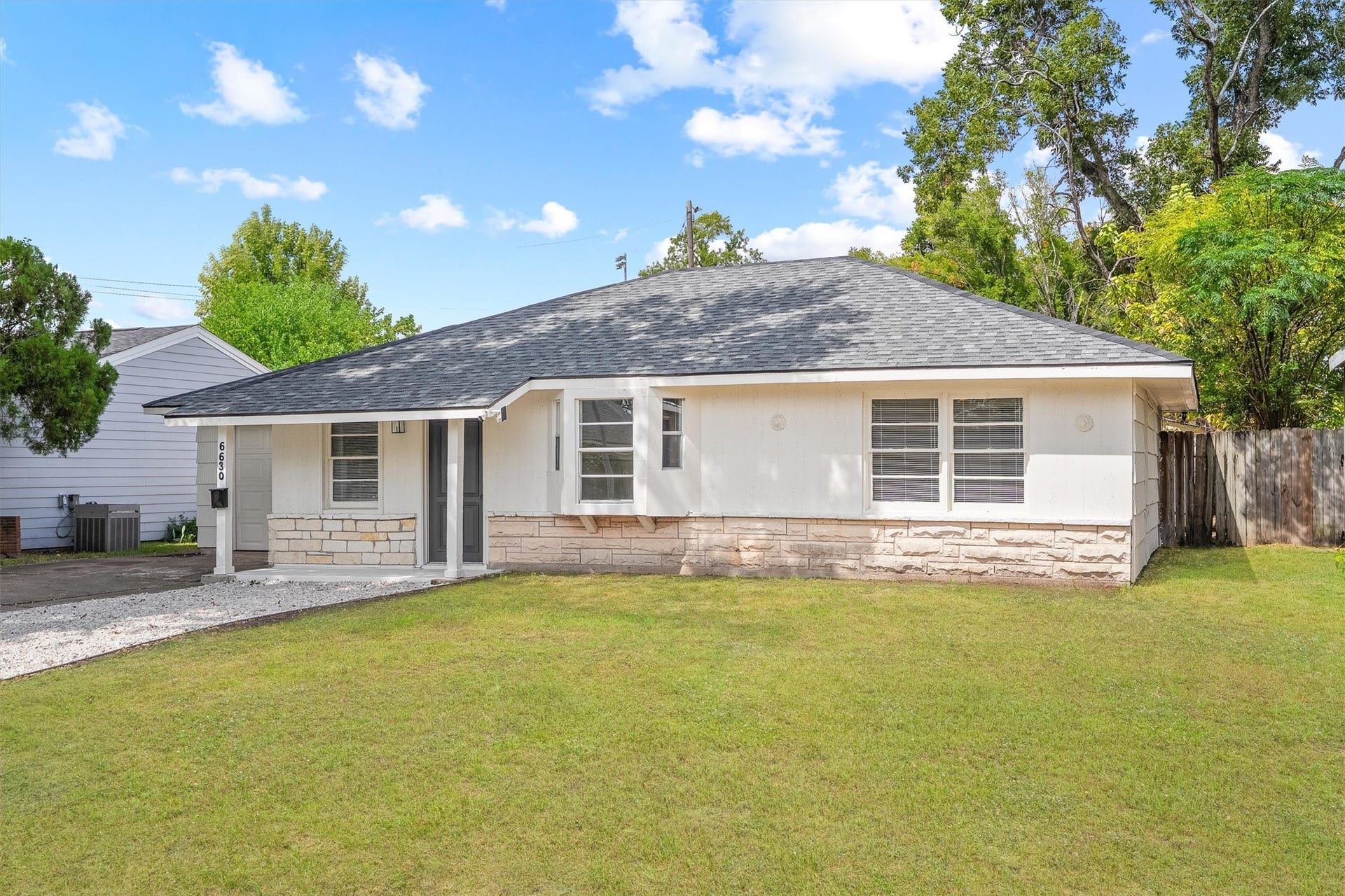 6630 Maybank Drive, Houston, TX 77055 Great single-story home with a modern roof and fresh exterior, set on a spacious, well-maintained lawn. Perfect for easy living in a serene neighborhood.