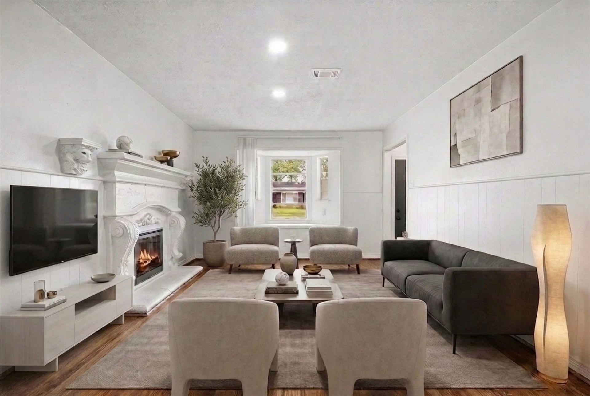6630 Maybank Drive, Houston, TX 77055 Experience elegant living with this room, featuring a cozy fireplace and abundant natural light, perfect for relaxation and entertainment. (Virtual Staging)