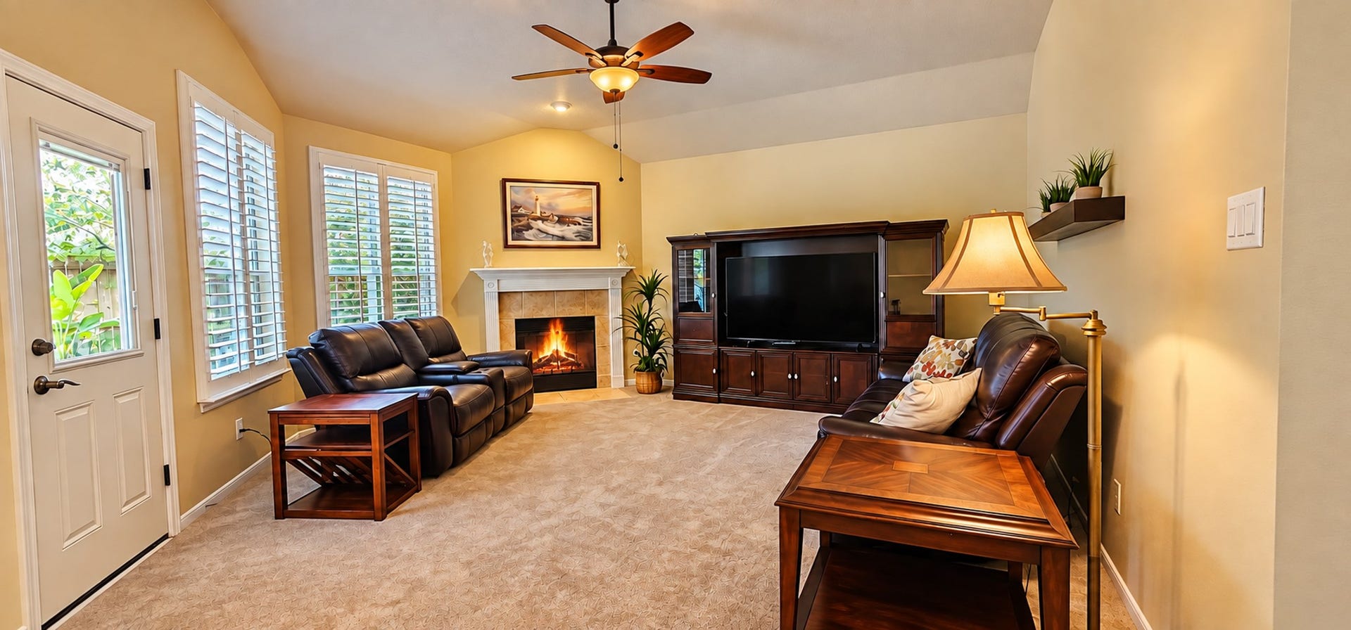 3511 Harbor Pass Lane, Friendswood, TX 77546 Family room that is ready for winter weather with the fireplace going.