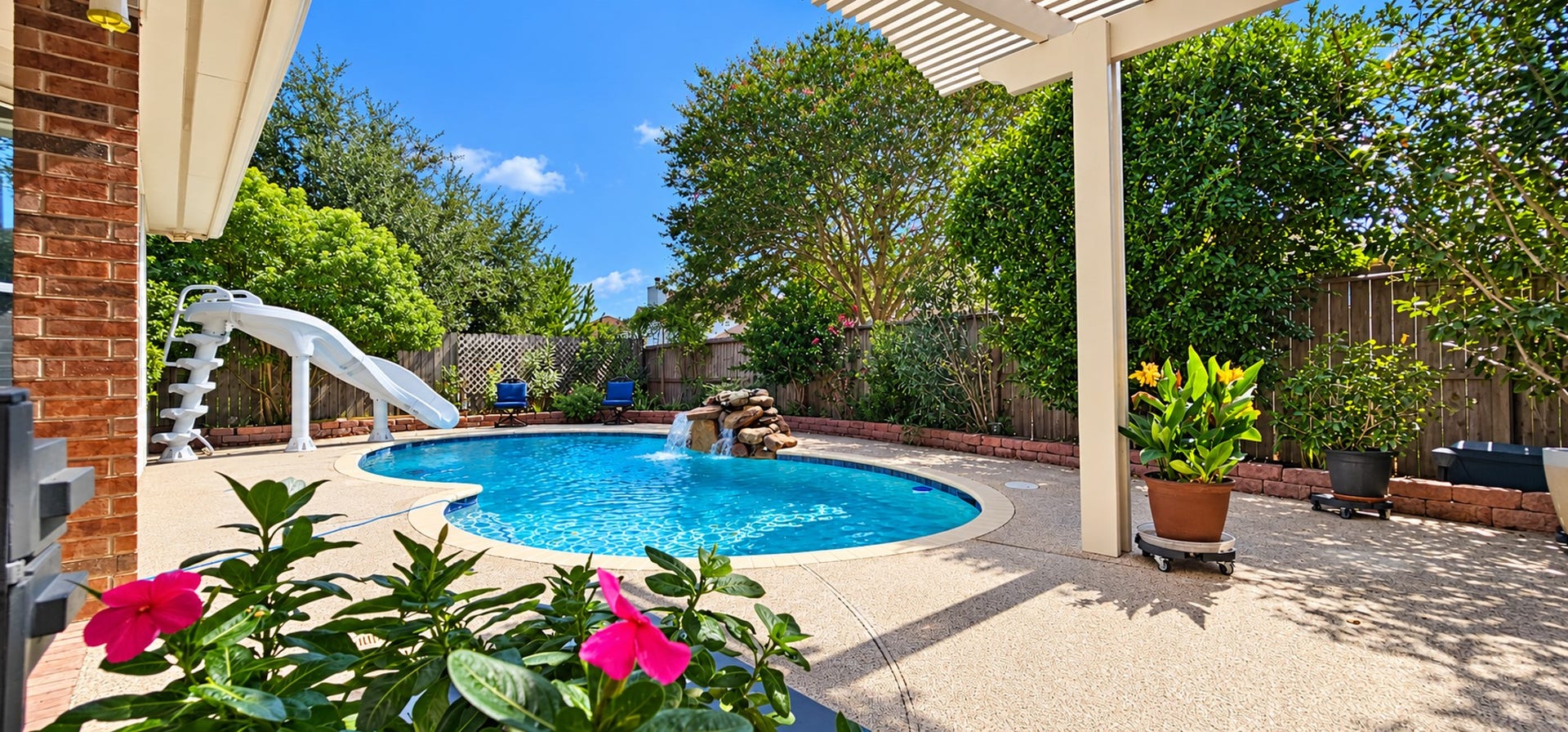 3511 Harbor Pass Lane, Friendswood, TX 77546 Discover your backyard paradise with a sparkling pool, lush greenery, and a relaxing oasis perfect for entertaining or unwinding.