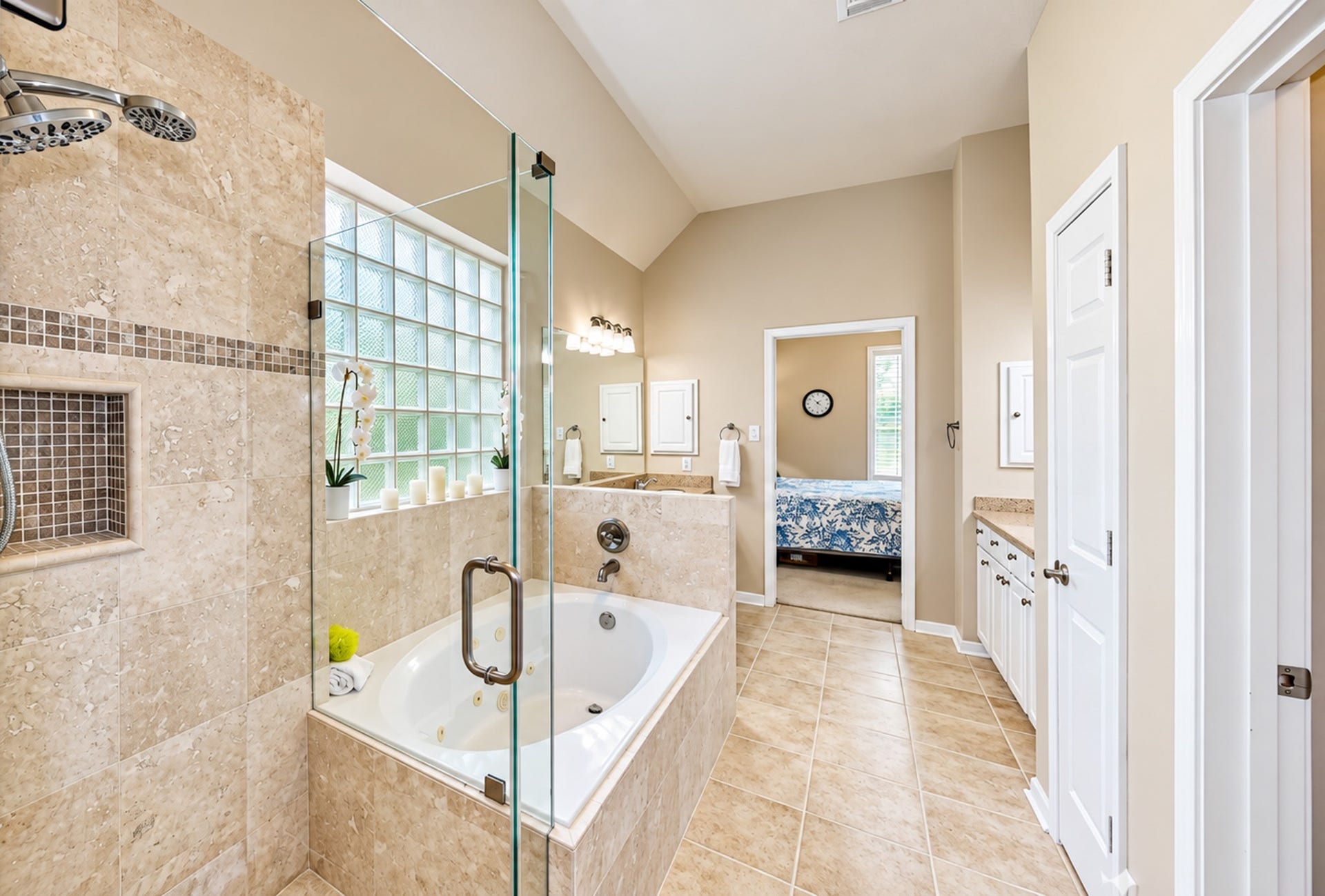 3511 Harbor Pass Lane, Friendswood, TX 77546 Primary Bath offers a spa tub, walk-in shower, and double dinks.