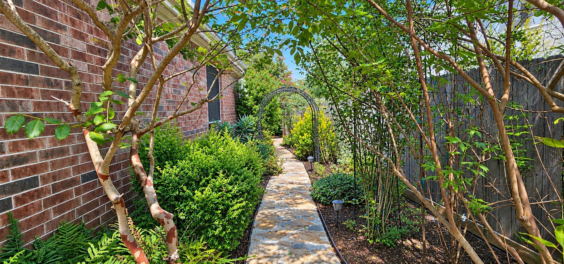 3511 Harbor Pass Lane, Friendswood, TX 77546 Fall in Love with the secrete garden on the side of the home.
