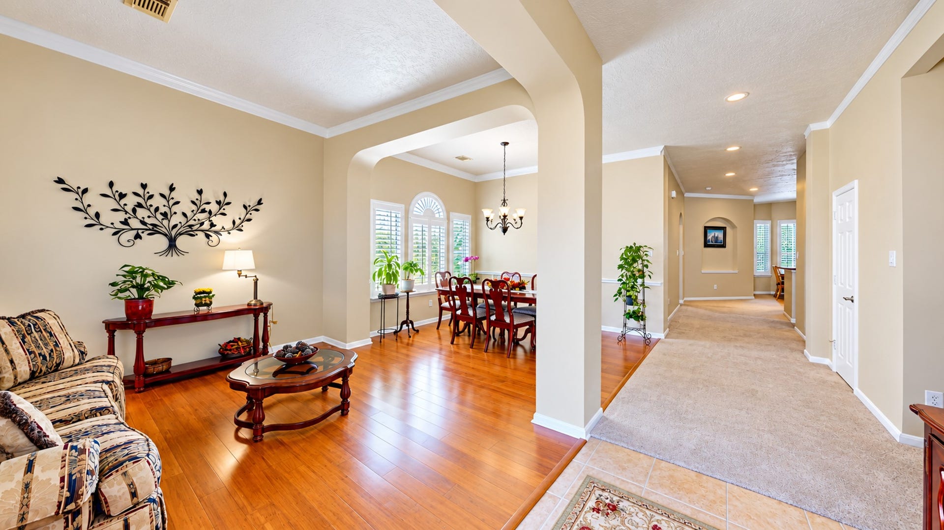 3511 Harbor Pass Lane, Friendswood, TX 77546 Luxurious bamboo flooring graces the entryway, creating an inviting and elegant ambiance for guests.
