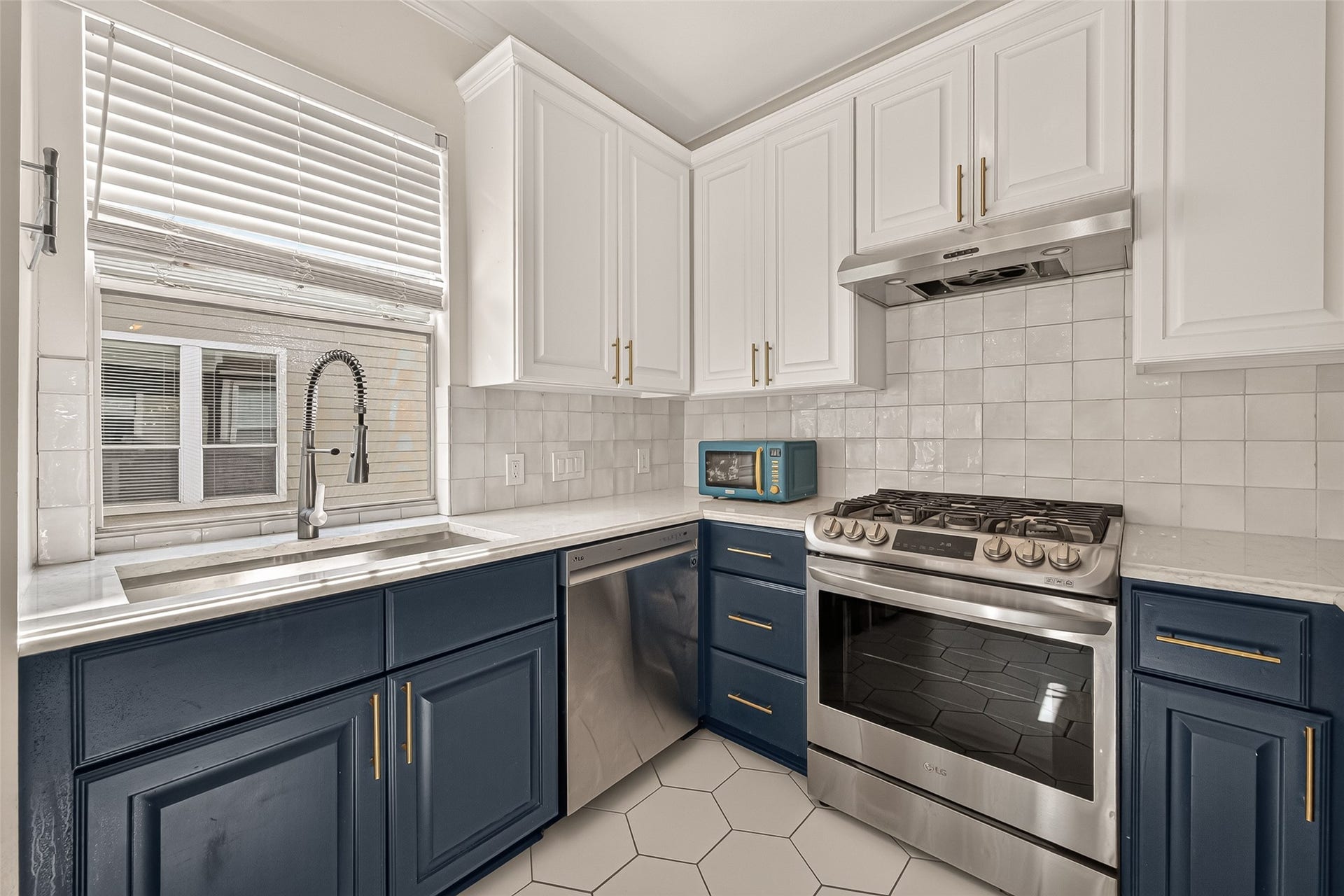 2903 Austin Street, Houston, TX 77004 Bright, inviting kitchen featuring a window over the sink that brings in natural sunlight.